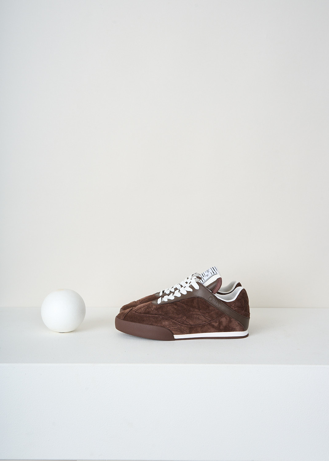 Chloé Kick Chocolate Brown suede sneakers with panelled design, almond-shaped toe and branded tongue patch, luxury designer footwear at Kiki's Stocksale Maastricht