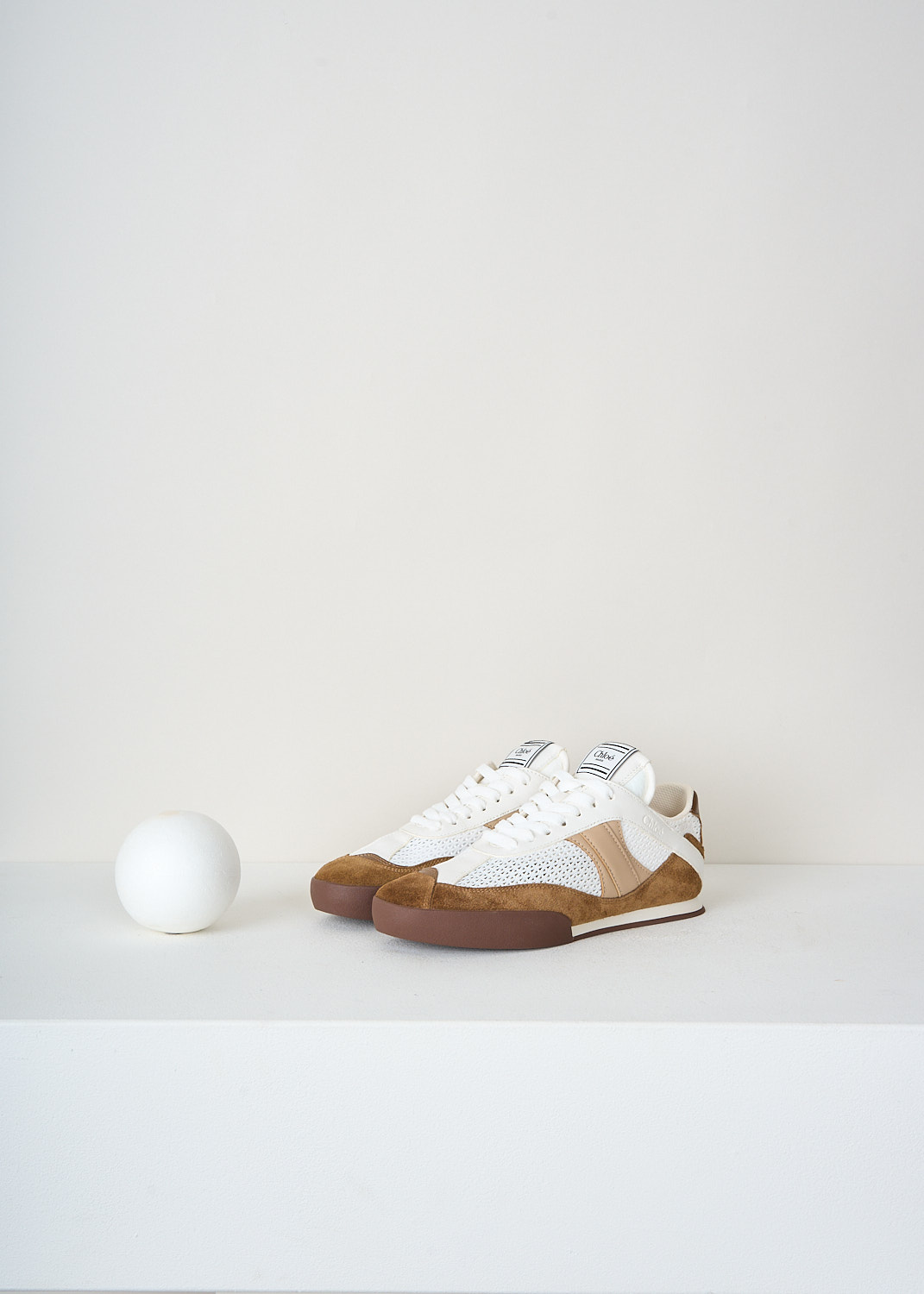 Chloé Kick Natural Brown low-top sneakers with tonal lace-up fastening and almond-shaped toe, luxury designer shoes at Kiki Niesten Maastricht
