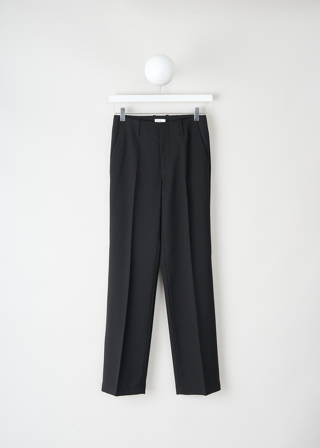 Slim fit trousers in black with waistband, belt loops and concealed clasp-and-zip closure at Kiki's Stocksale Maastricht designer outlet.