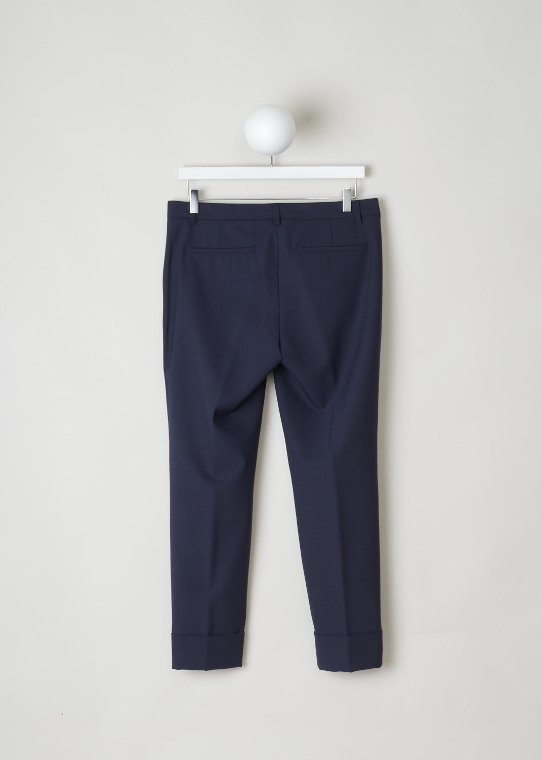 CLOSED, NAVY BLUE TROUSERS, STEWART_C91796_5H3_22_568, Blue, Back, Made in the classic trouser model, featuring forward slanted pockets on the front and two welt pockets in the back. What makes this model stand out above the rest is the broad fold-over hem.
