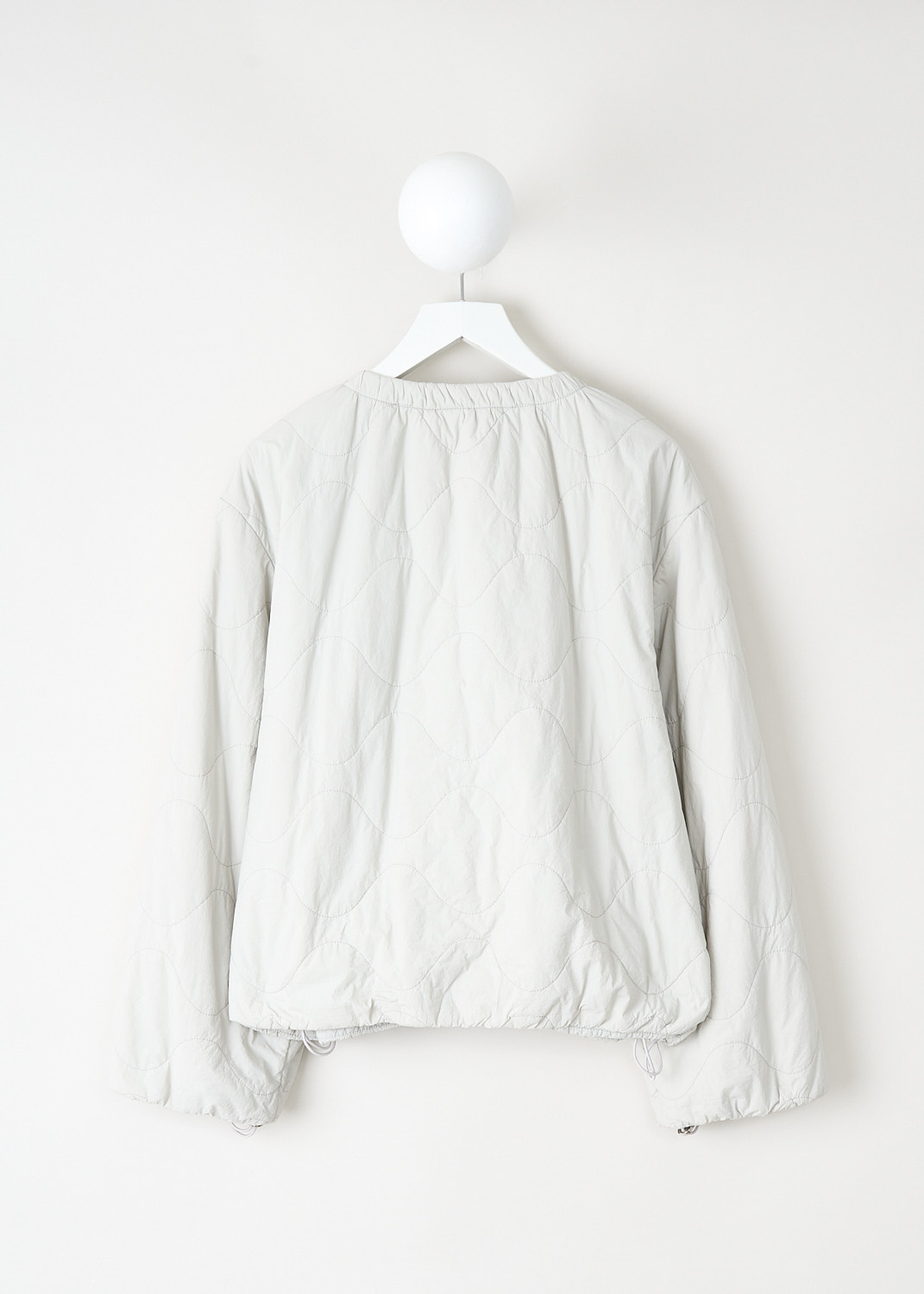 Back view of Closed short quilted bomber jacket with relaxed silhouette and wide sleeves at Kiki's Stocksale Maastricht designer outlet.