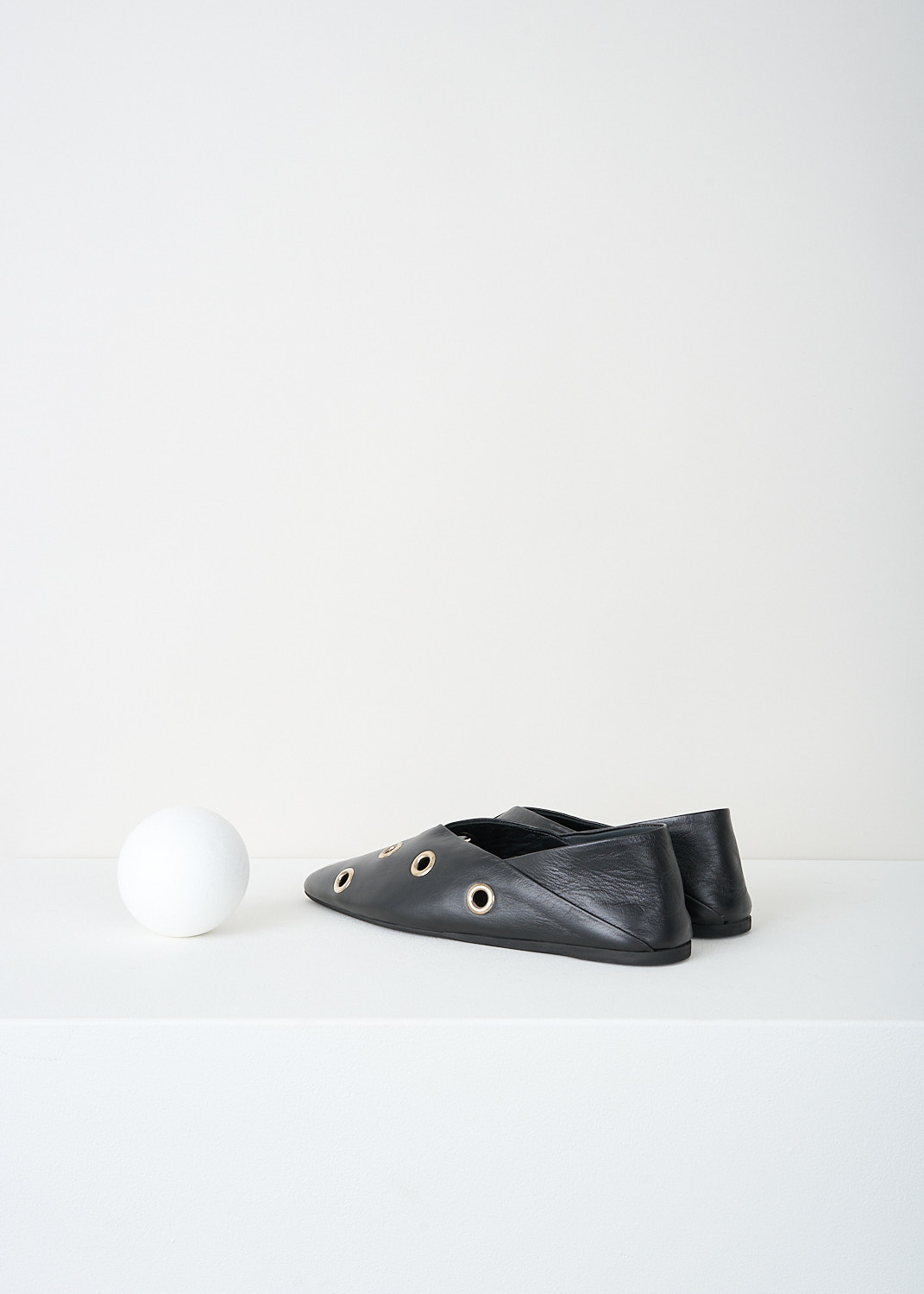 Closed, Black ballet flats with eyelet studs, BALLERINA_C99502_83V_22_100_BLACK, Black, Back, These black ballet flats have a pointed toe and diagonal stitching on the heel. Decorative silver-tone eyelet studs are used throughout. 
