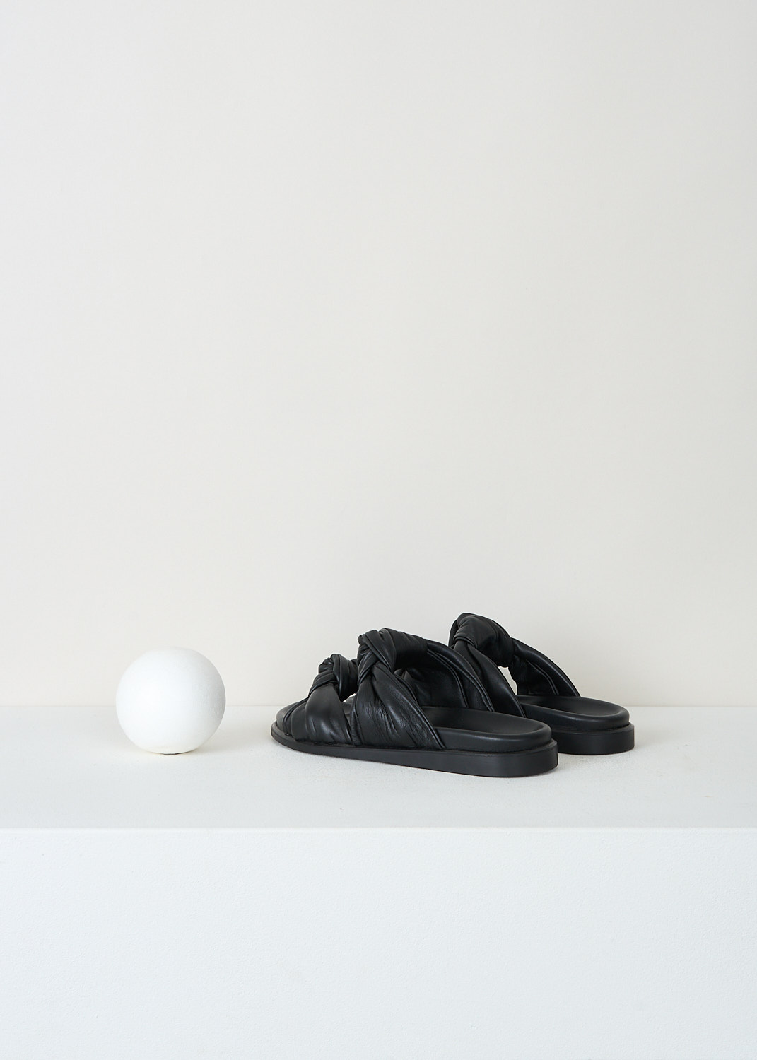 Dear Frances Tye leather slides in Black with twin knot straps across the foot, luxury designer footwear at Kiki’s Stocksale Maastricht