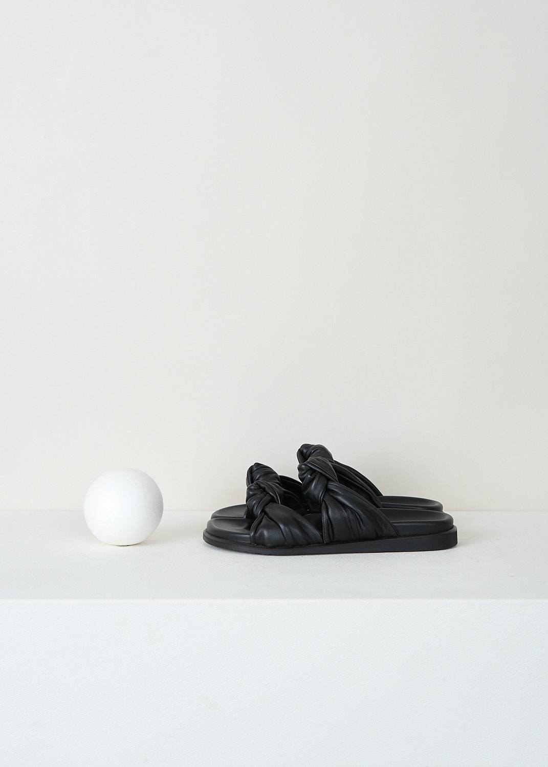 Dear Frances Tye leather slides in Black with twin knot straps across the foot, luxury designer footwear at Kiki’s Stocksale Maastricht