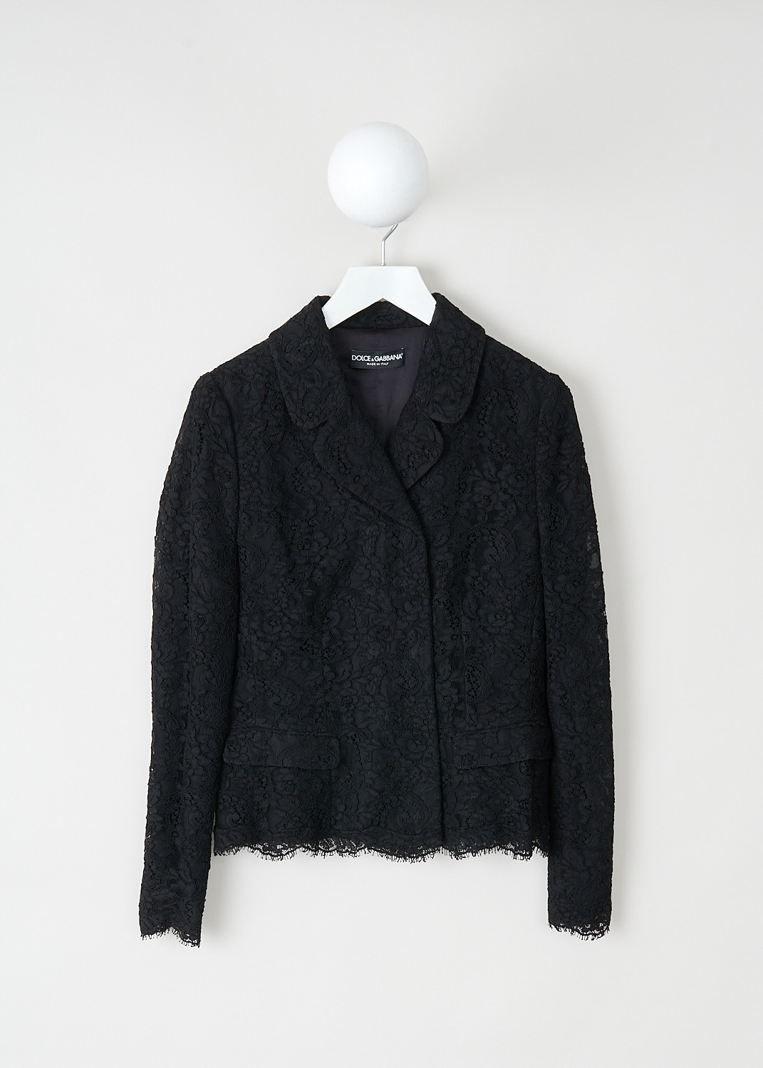 Dolce & Gabbana, Fitted black lace jacket, F283KT_FLM7J_N0000, Black, Front, This fitted back lace jacket has a notched lapel, a concealed front press-button closure and long sleeves. On the front, the jacket has two flap welt pockets.
