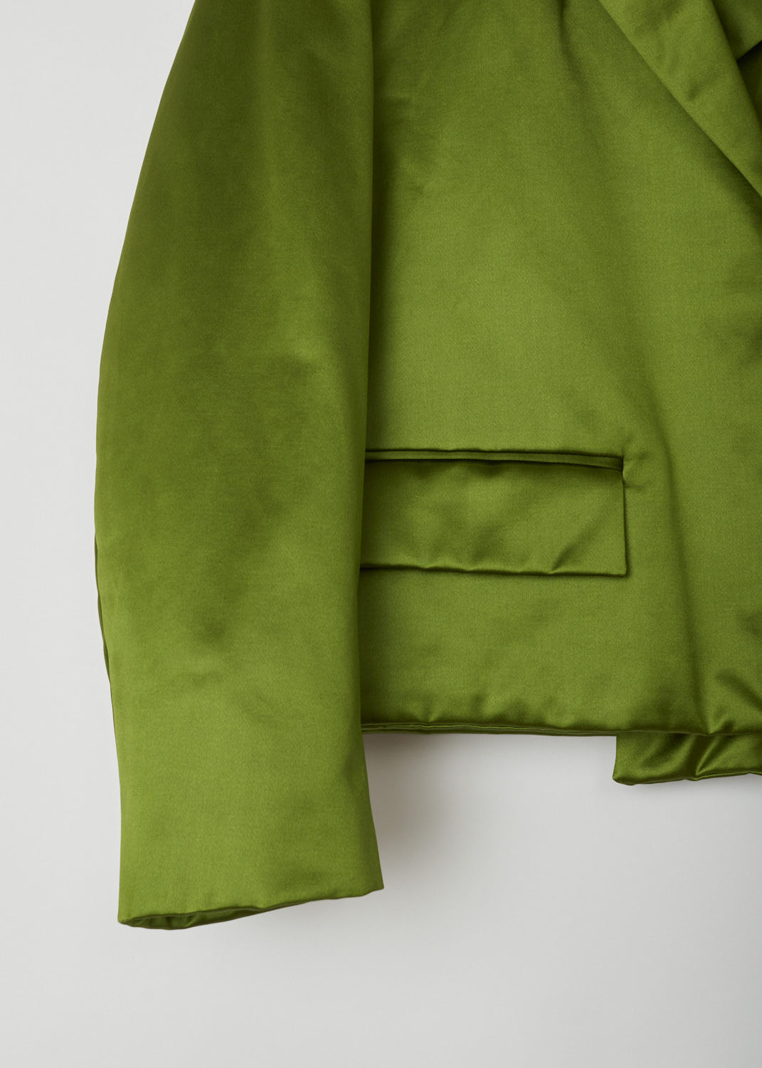 DRIES VAN NOTEN, METALLIC GREEN CROPPED JACKET, VONDI_3356_WW_JACKET_GRE, Green, Detail 1, This silky smooth cropped jacket has a notched lapel. The jacket does not have a closing function, meaning the jacket is open in the front. Two welt pockets with a flap can be found on the front of the jacket. 