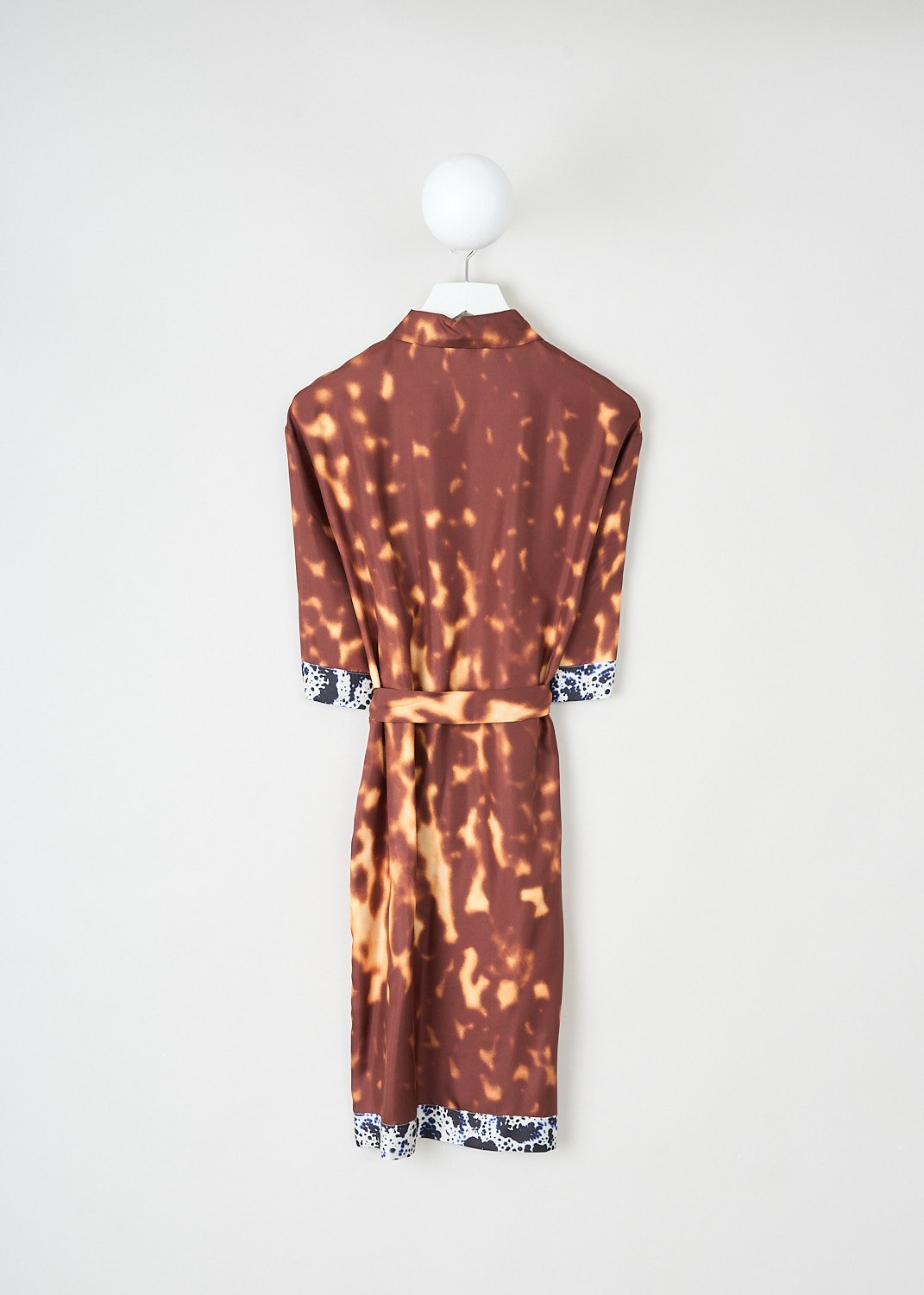 Dries van Noten, Doralia dress in Rust, DORALIA_1035_WW_DRESS_701_RUST, Brown, Orange, Print, Back, This silk Doralia shirt dress has a rust-colored tie dye pattern. The dress has a spread collar and a concealed front button closure. On the front, the dress has a single breast pocket. Both the short sleeves and the straight hem have a contrasting trim. The dress comes with a matching fabric belt to cinch in the waist.
