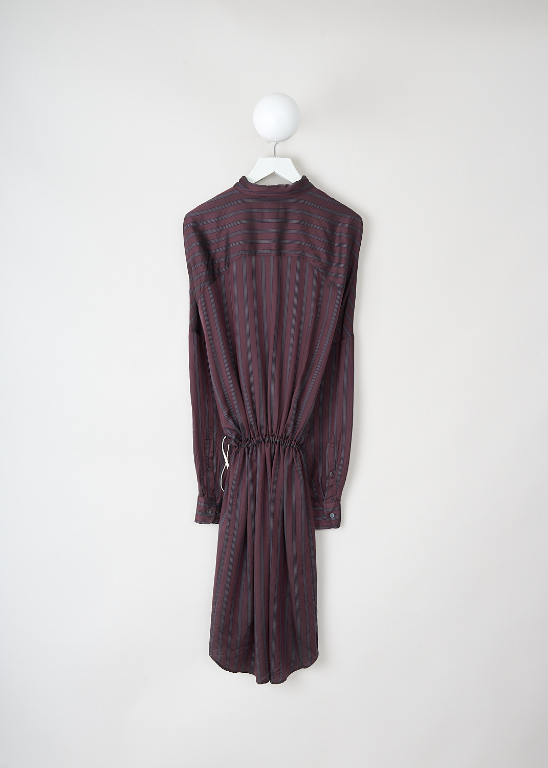 Dries van Noten, Dindia burgundy stripe dress, DINDIA_2267_WW_DRESS_358_BURGUNDY, Purple, Back, This Dindia burgundy stripe shirt dress has a classic collar and a front button closure. The dress has wide dolman sleeves with buttoned cuffs. Along the waist, a contrasting white drawstring can be used to cinch in the waist.
