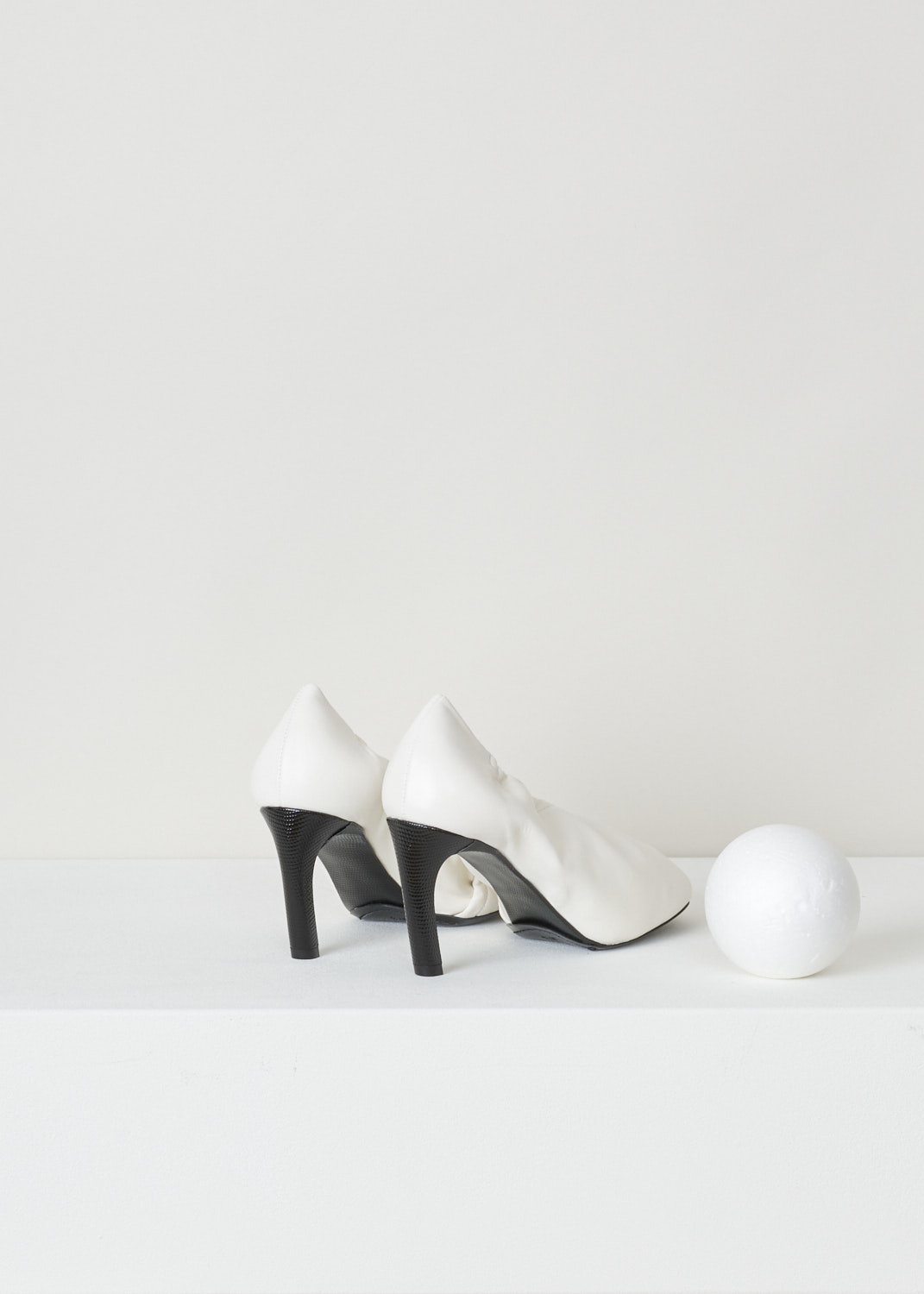 Dries van Noten, Off-white pump with an elastic fold-over vamp, WS211_138_H80_QU155_white001, back, white black, Off-white pumps made entirely out of soft and smooth calfskin. A quirky feature on this model is the elastic topline which folds over the toe vamp, ensuring a unique design feature. The toe vamp comes in a square format. Another lovely feature on this model is the heel which is cover in black embossed leather. 

Heel height: 7.5 cm / 2.95 inch.
