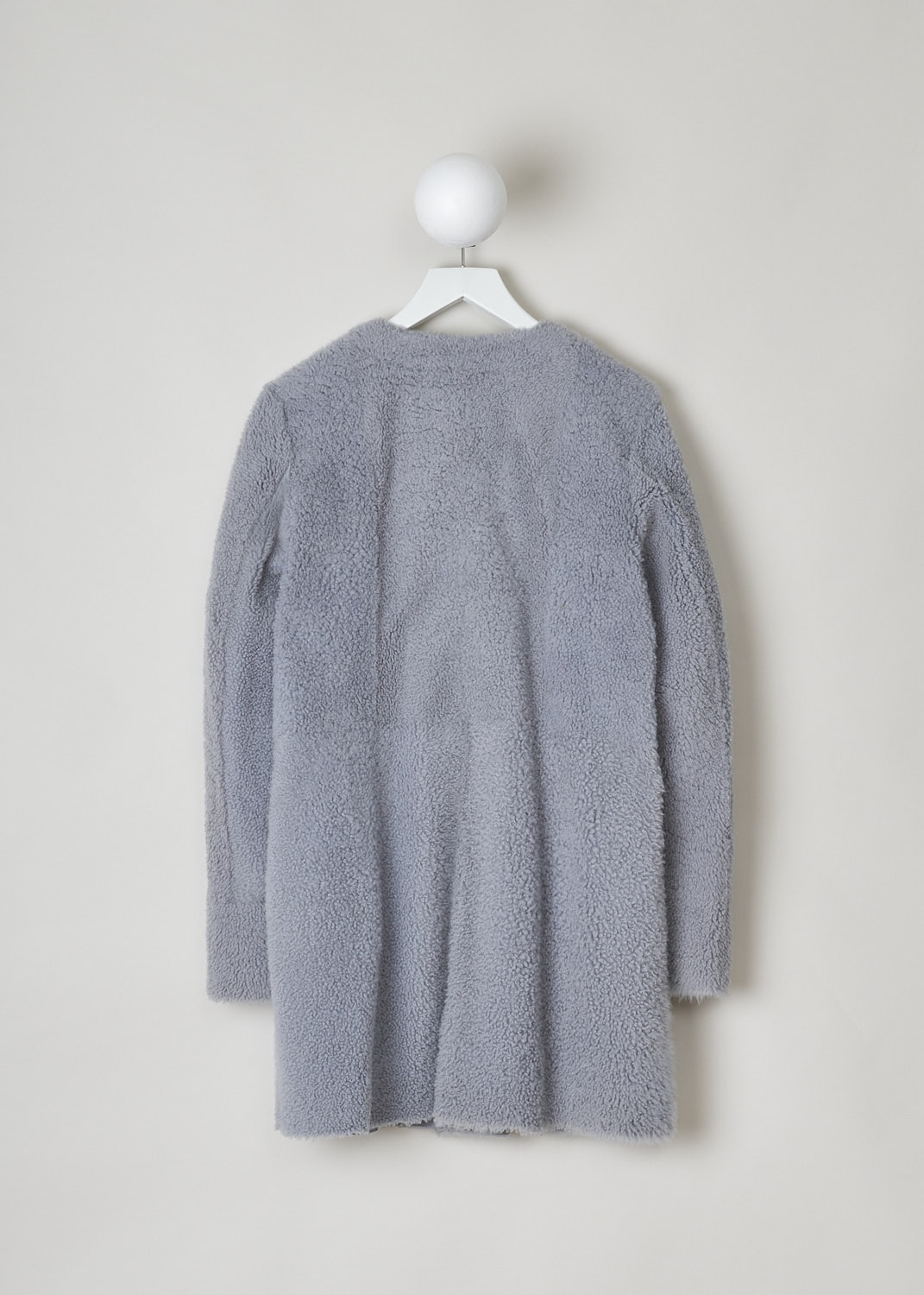 DROME, LIGHT GREY REVERSIBLE LAMMY, DPD5098FP_D1726P_C102, Grey, Back, This light grey lammy coat has a collarless round neckline and a concealed press-stud closure. The coat is reversible, with light grey shearling on one side and smooth leather on the other side. The leather side is constructed with different seams, giving it a paneled look. Both sides have slanted pockets. 

