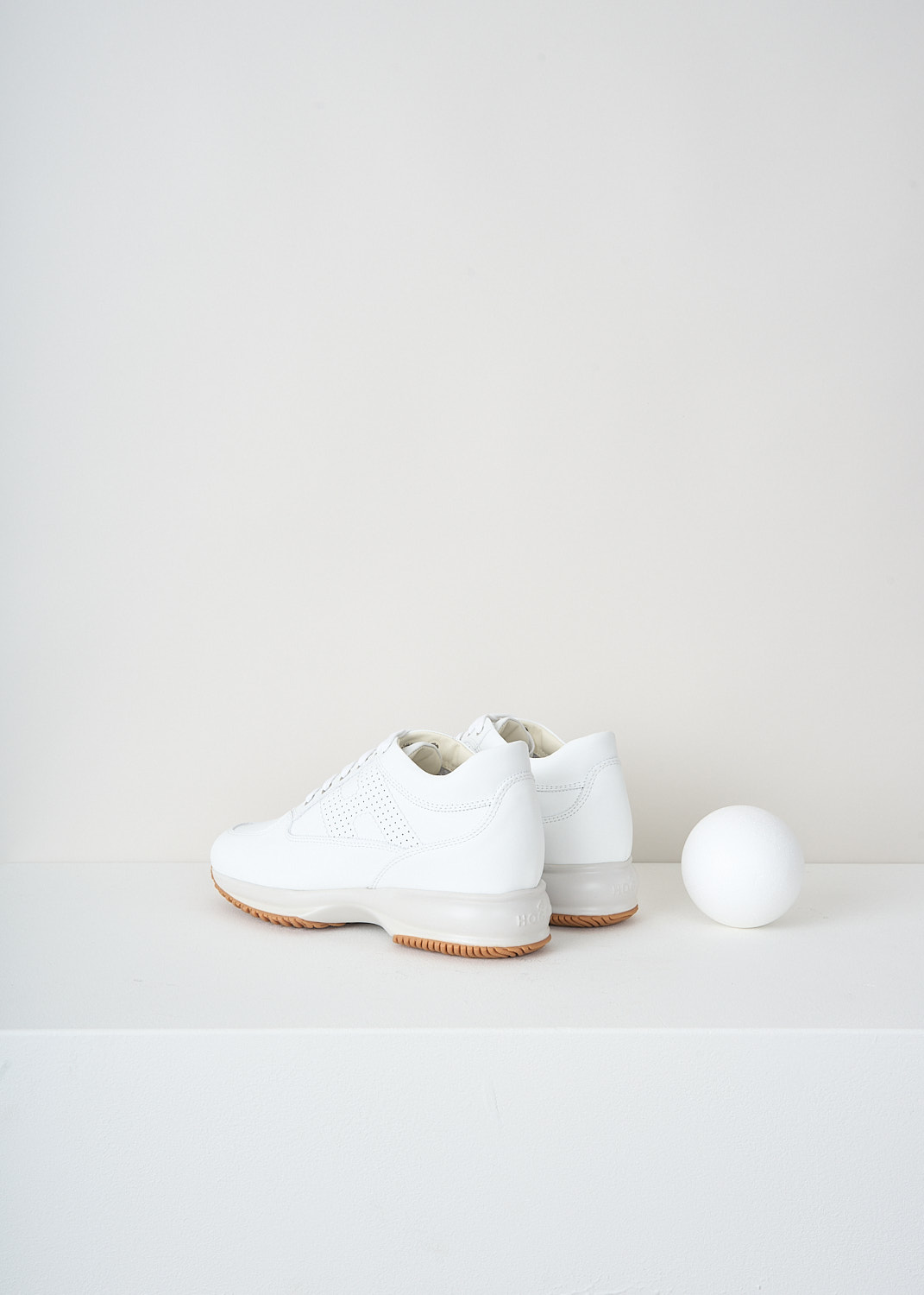 Hogan, White interactive sneakers, 
HXW00N00E30_KLA_B001, White, Back, These all-white leather sneakers feature front lace-up fastening with white laces. These sneakers have a almond shaped toe and a white rubber sole. On the sides, the sneakers have a perforated H logo incorporated in the design.