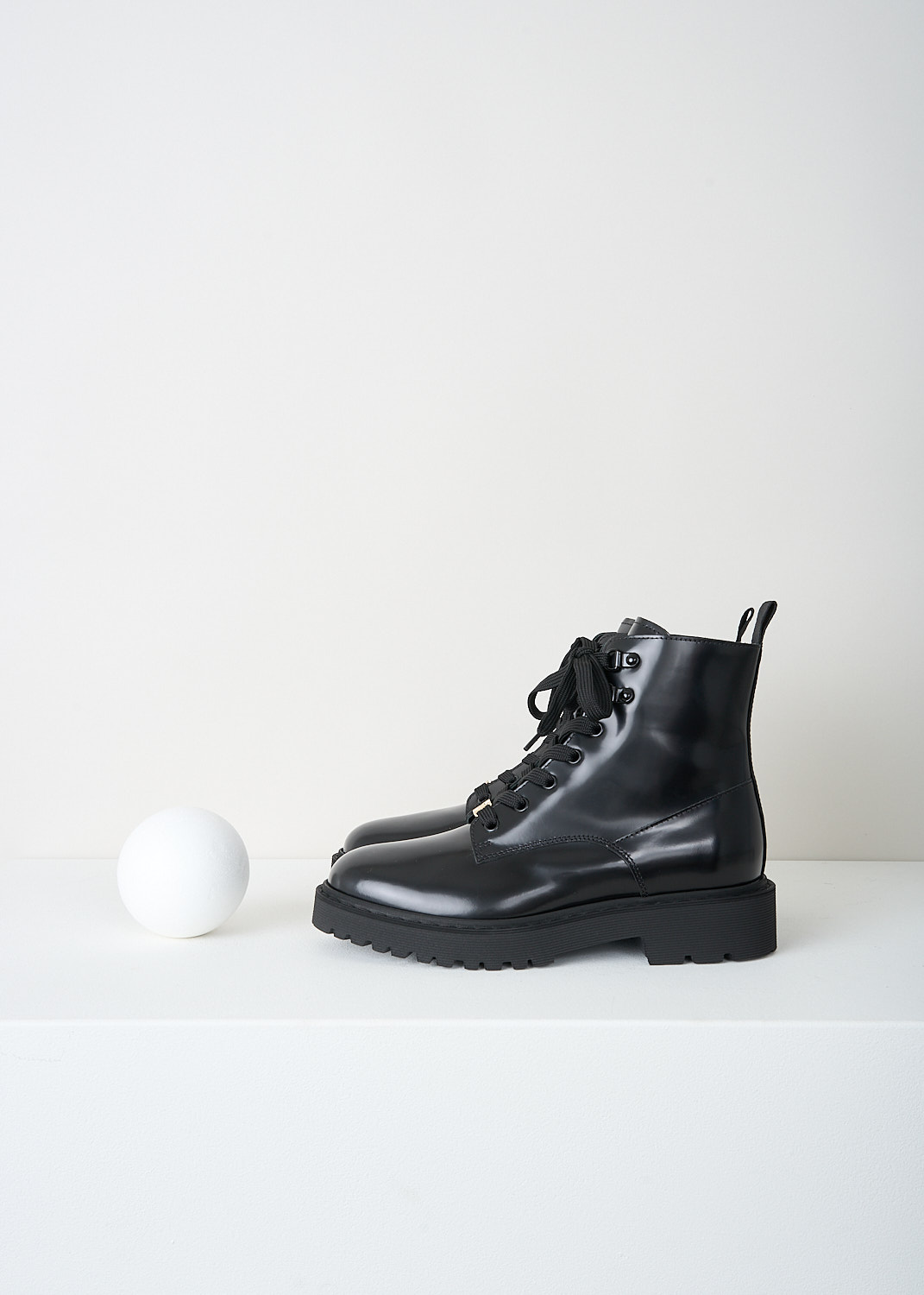 Hogan, Black lace-up ankle boots, HXW5430DR52_RWW_B999,  Black, Side, These polished black leather ankle boots have a lace closure, a pull tab on the heel and a round toe. These boots have rubber platform soles with a small heel.
