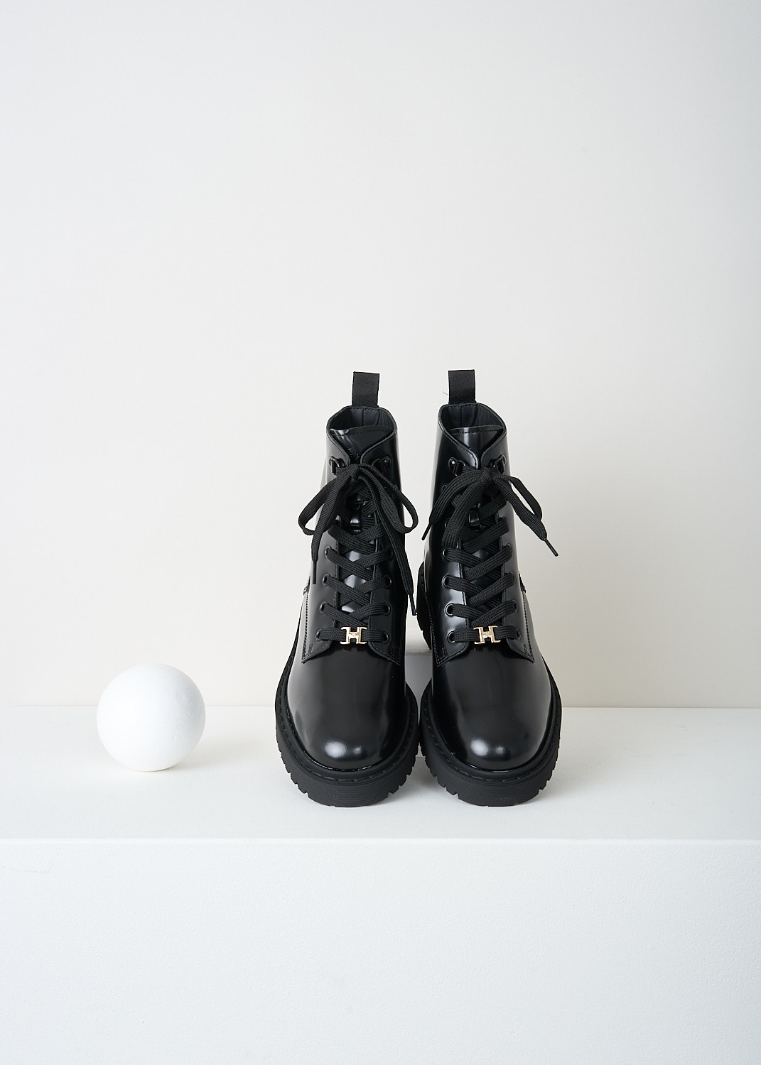 Hogan, Black lace-up ankle boots, HXW5430DR52_RWW_B999,  Black, Top, These polished black leather ankle boots have a lace closure, a pull tab on the heel and a round toe. These boots have rubber platform soles with a small heel.
