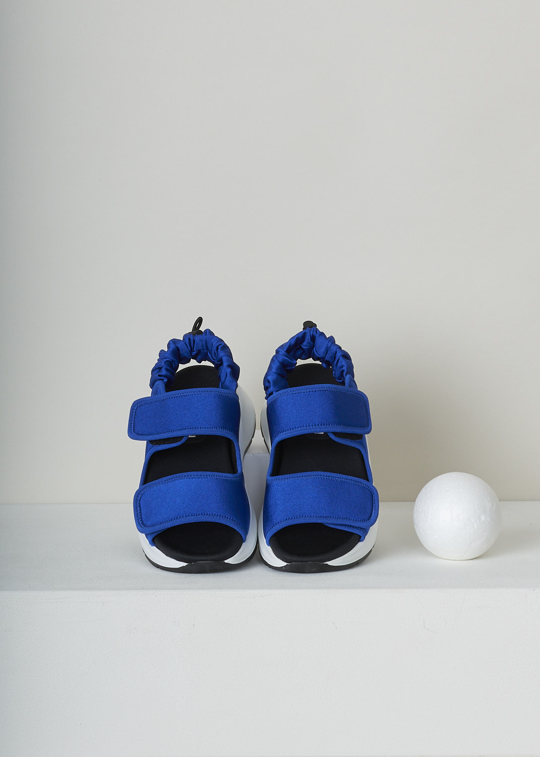 HOGAN, ROYAL BLUE CHUNKY SANDAL, HXW5980EB40R80U615_H598_SANDALO_R80, Top, Side, These royal blue open toe sandals feature a double strap with Velcro across the vamp and toe and an elasticated slingback strap with a pull tab along the ankle. The sandals have a chunky sole in contrasting white. 
