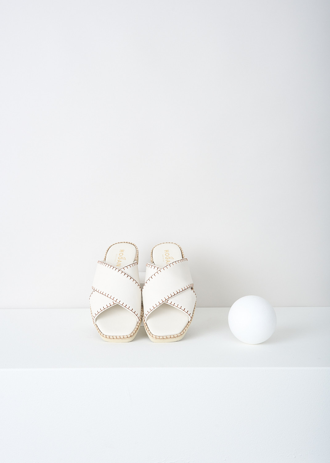 Hogan, Off-white leather slides with contrast stitching, HXW6600FH40_LE9_B013, White, Top, These flat slip-one slides have an off-white criss-cross strap with contrasting stitching. 

