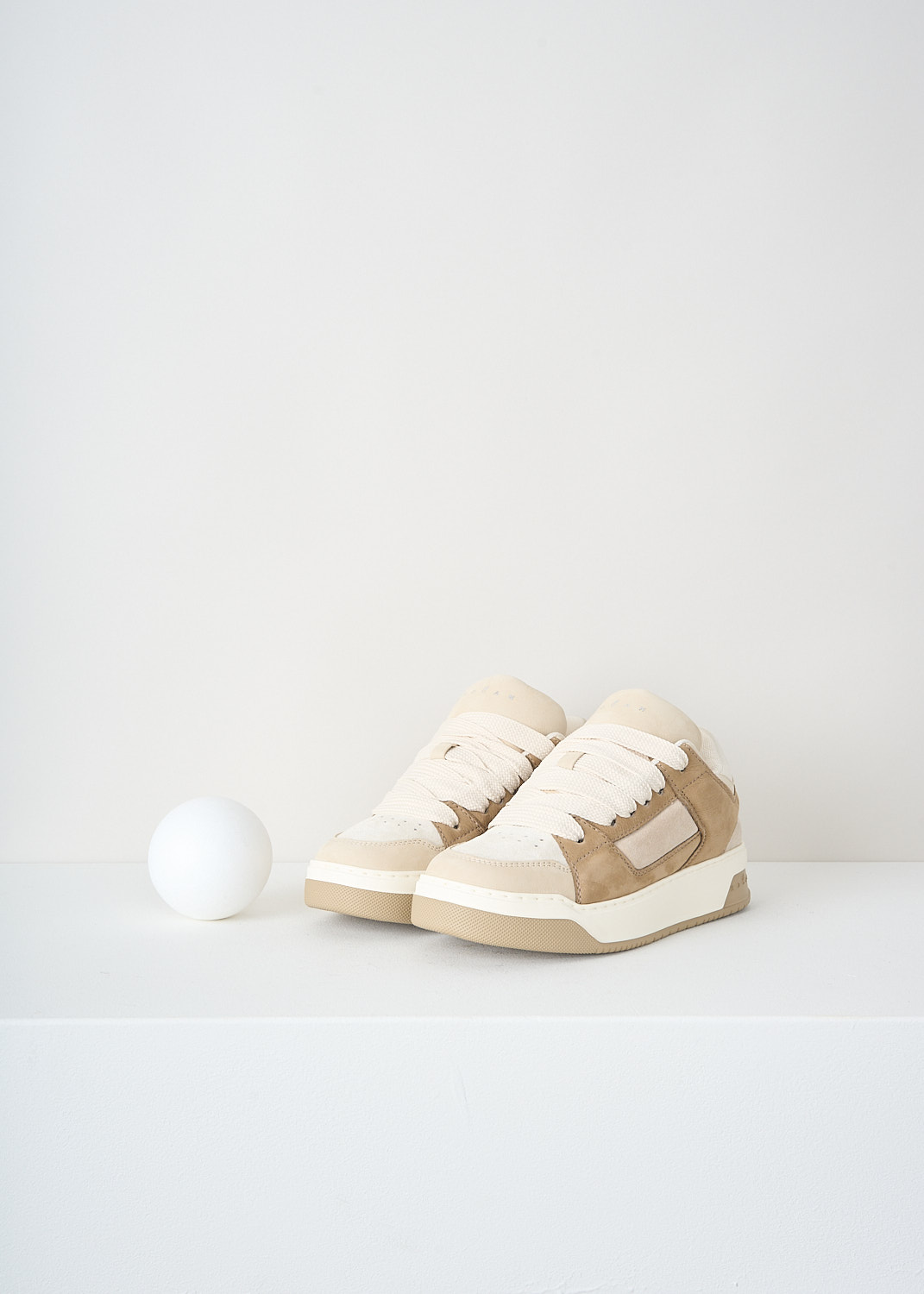 Hogan, Brown-and-beige H667 allacciato sneakers, HXW6670FL40_TQC_0SA1, Brown, Beige, Front, These brown-and-beige H667 allacciato sneakers feature a front lace-up fastening and a round toe. The different inserts create a paneled look. These shoes have a puffed-up tongue with the brand's logo on it in silver-tone lettering.

