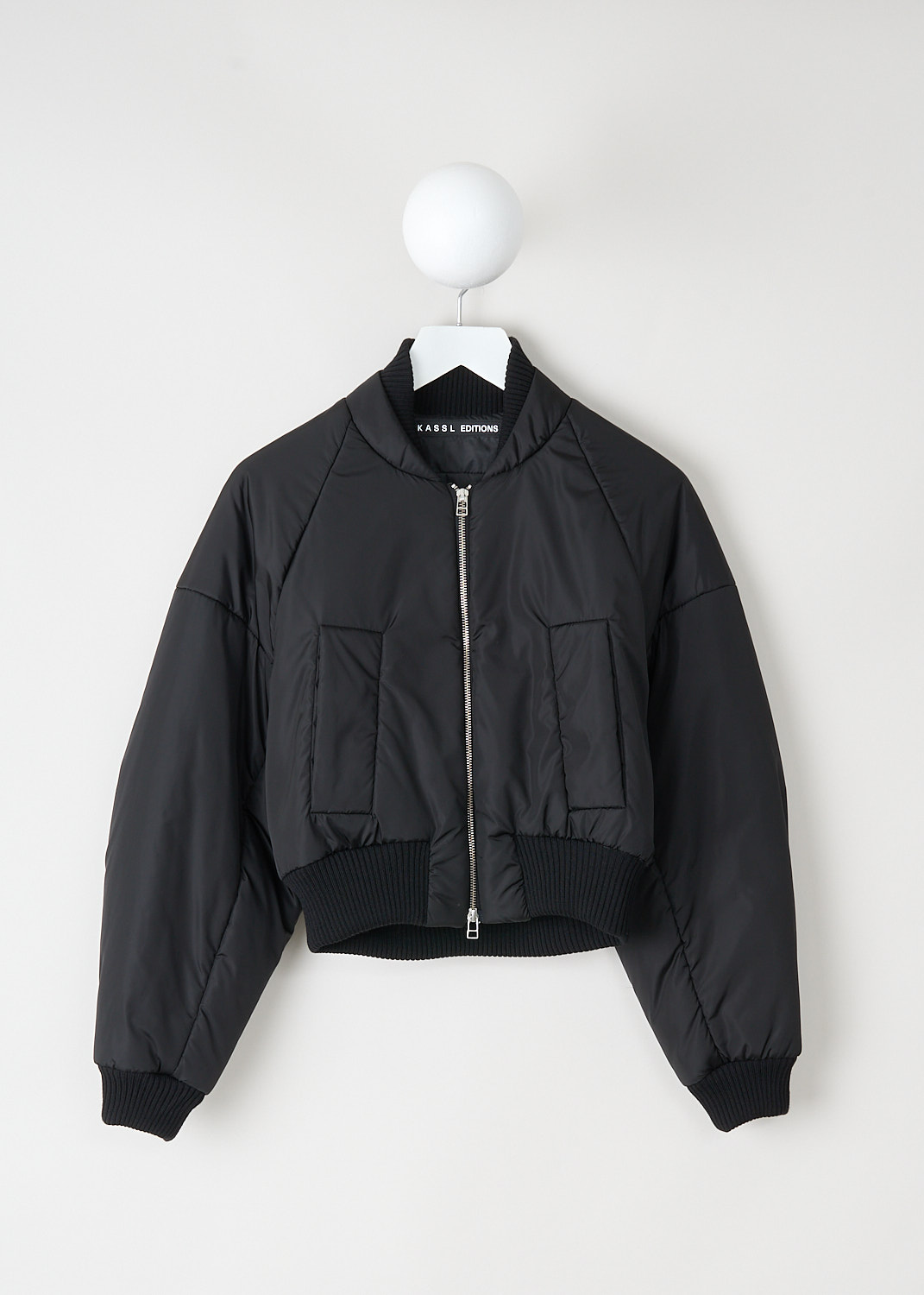 Cropped bomber jacket by Kassl Editions in nylon with balloon sleeves, elasticated waist and cropped fit, Kiki’s Stocksale Maastricht designer outlet.