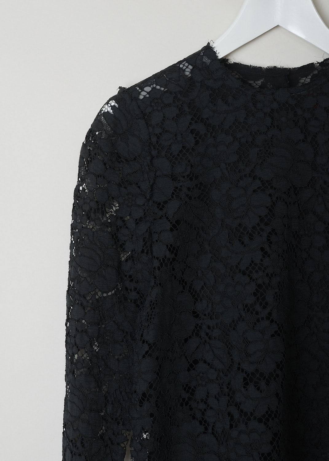 LANVIN, BLACK LACE TOP, W060771468C5B_NOIR, Black, Detail, This black lace top with black silk lining has a round neckline with a raw finish. In the back of the neck, a concealed snap button functions as the closure option.  The long sleeves have zipped cuffs. The straight hemline also has a raw finish.
