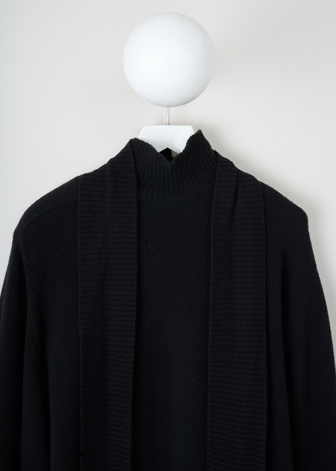 Marie Adam-Leenardt, Oversized distorted black turtleneck sweater, DISTORTED_TURTLENECK_4003_9999_BLACK, Black, Detail, This oversized distorted black turtleneck sweater has an incorporated ribbed scarf that can be worn both to the front or back. The sweater has a mock-neckline, dropped shoulders and extra long sleeves. The cuffs and hem have a ribbed finish.  
