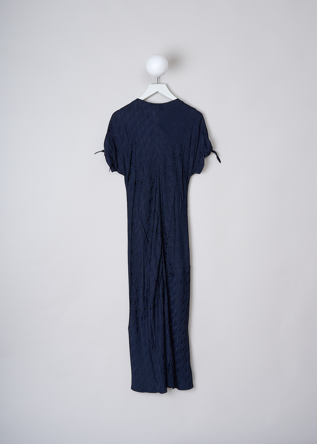 MARNI, INK BLUE FLUID JACQUARD MAXI DRESS, ABMA0871A0_UTV902_00B80, Blue, Back, This Ink blue fluid maxi dress has a geometric jacquard print. The dress has a bow-tie neckline with a deep V. The short sleeves have tie cuffs. The long skirt flares out slightly at the bottom. The dress is fully lined.
