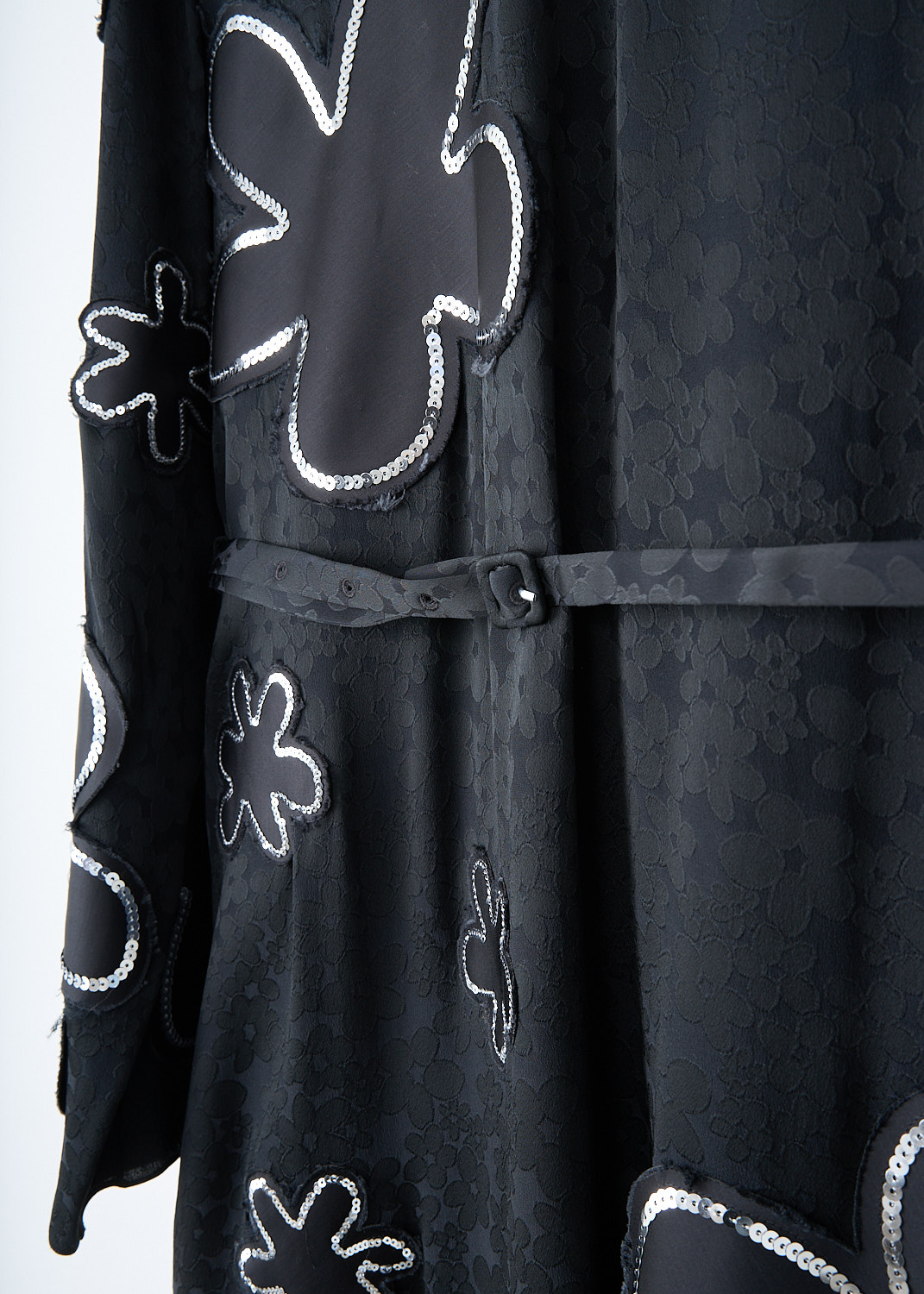 Marni, Black satin-jacquard midi dress, ABMA1386UX_USR008_00N99, Black, Print, Silver, Detail, This black satin-jacquard midi dress has a round neckline and long sleeves. The dress has a print with big flowers that have silver-tone sequin trims. The dress comes with a matching belt to cinch in the waist. In the back, a concealed hook and zip function as the closure.
