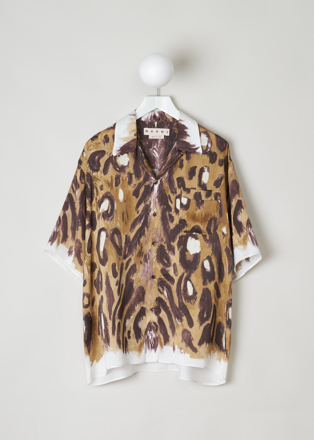 MARNI, ANIMAL PRINT BLOUSE WITH SHORT SLEEVES, CAMA0501A0_UTV912_WBM20, Brown, Print, Front, This loose fitting short sleeved blouse is made in a satin animal print. This blouse features a classic collar, a single breast pocket and front button fastening. This model has an asymmetrical finish, meaning the back is a little longer than the front.
