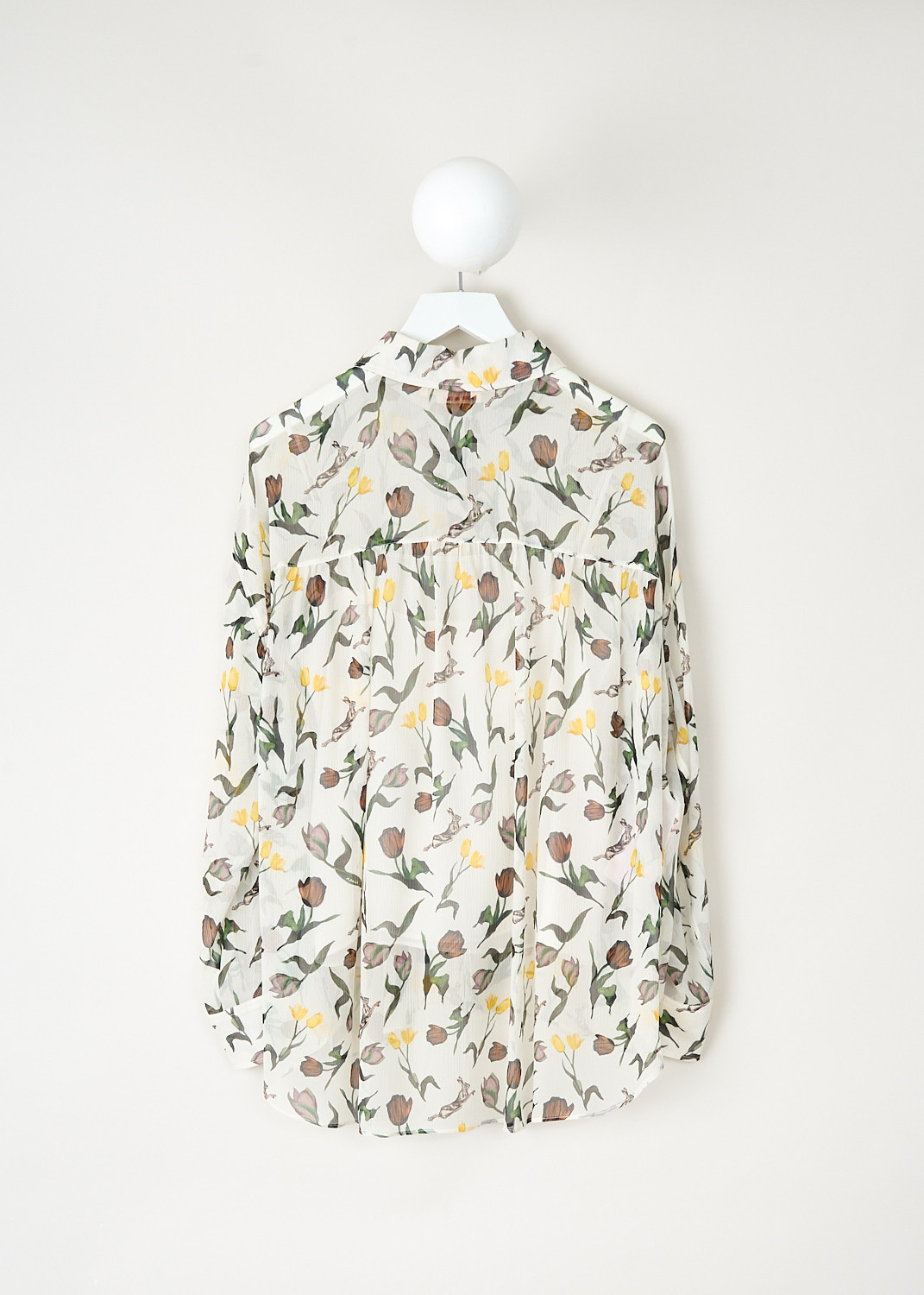 Back view of Marni semi-sheer blouse with gathered back yoke and rounded hem, including matching camisole, available at Kiki's Stocksale designer outlet in Maastricht.