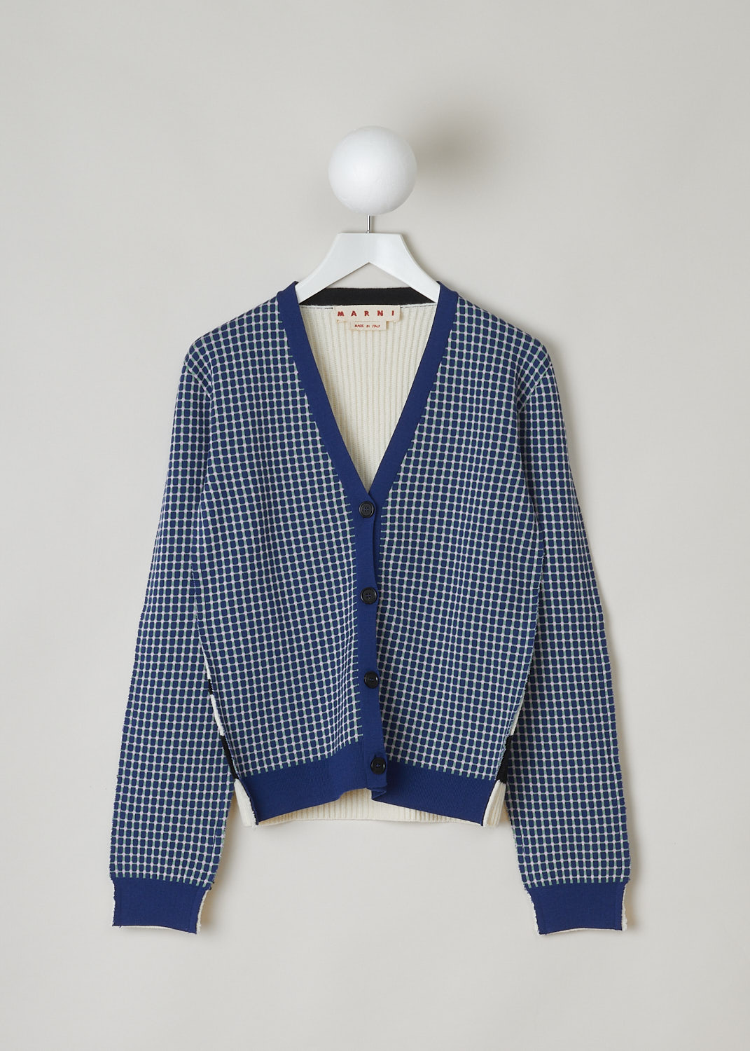 MARNI, ICONIC HALF & HALF MULTICOLOR CARDIGAN, CDMD0322Q0_UFW523_M2X99, Print, Blue, Pink, Front, This Iconic Half & Half cardigan has a smooth multicolor print front and a ribbed white back with black horizontal stripes. The cardigan has a V-neck with a blue button placket. The long sleeves have cuffs in that same blue fabric. The cardigan has raw edges throughout. 

