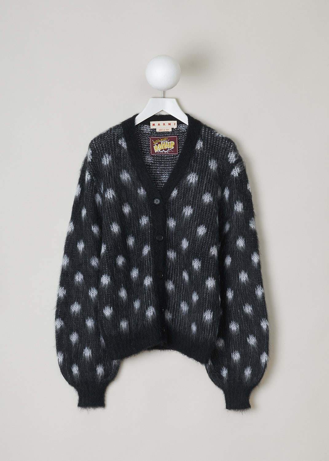 MARNI, BRUSHED DOTS FUZZY WUZZY CARDIGAN, CDMD0326Q0_UFU160_DON99, Black, Print, Grey, Front, This brushed dots Fuzzy Wuzzy cardigan has a black V-neckline with a front button closure. The sweater has a two-tone dot pattern in black and grey. The long balloon sleeves have ribbed cuffs. That same ribbed finish can be found on the hemline.
