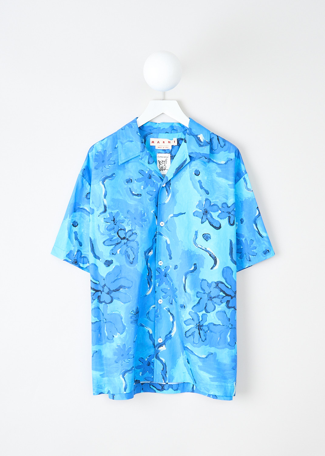 Marni, Azure blue poplin blouse with floral print, CAMA0383M0_UTC230_MMB52, Blue, Print, Front, This Azure blue poplin blouse with floral print has a notched lapel with a V-neckline and a front button closure. The short sleeves have straight cuff endings. The blouse has a wide fit. 
