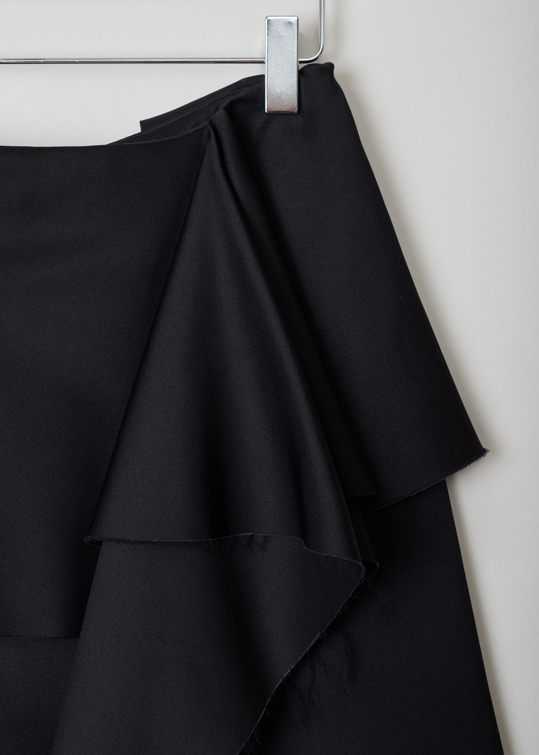 Marni, Black satin A-line skirt, GOMAT64JY0_TSD60_00N99_black, black, detail1, Black a-line skirt crafted from satin fabric. All the edges of the fabric are frilled and unfinished, featuring similarities with a wrap skirt. Furthermore a concealed zip fastening can be found on the back. 