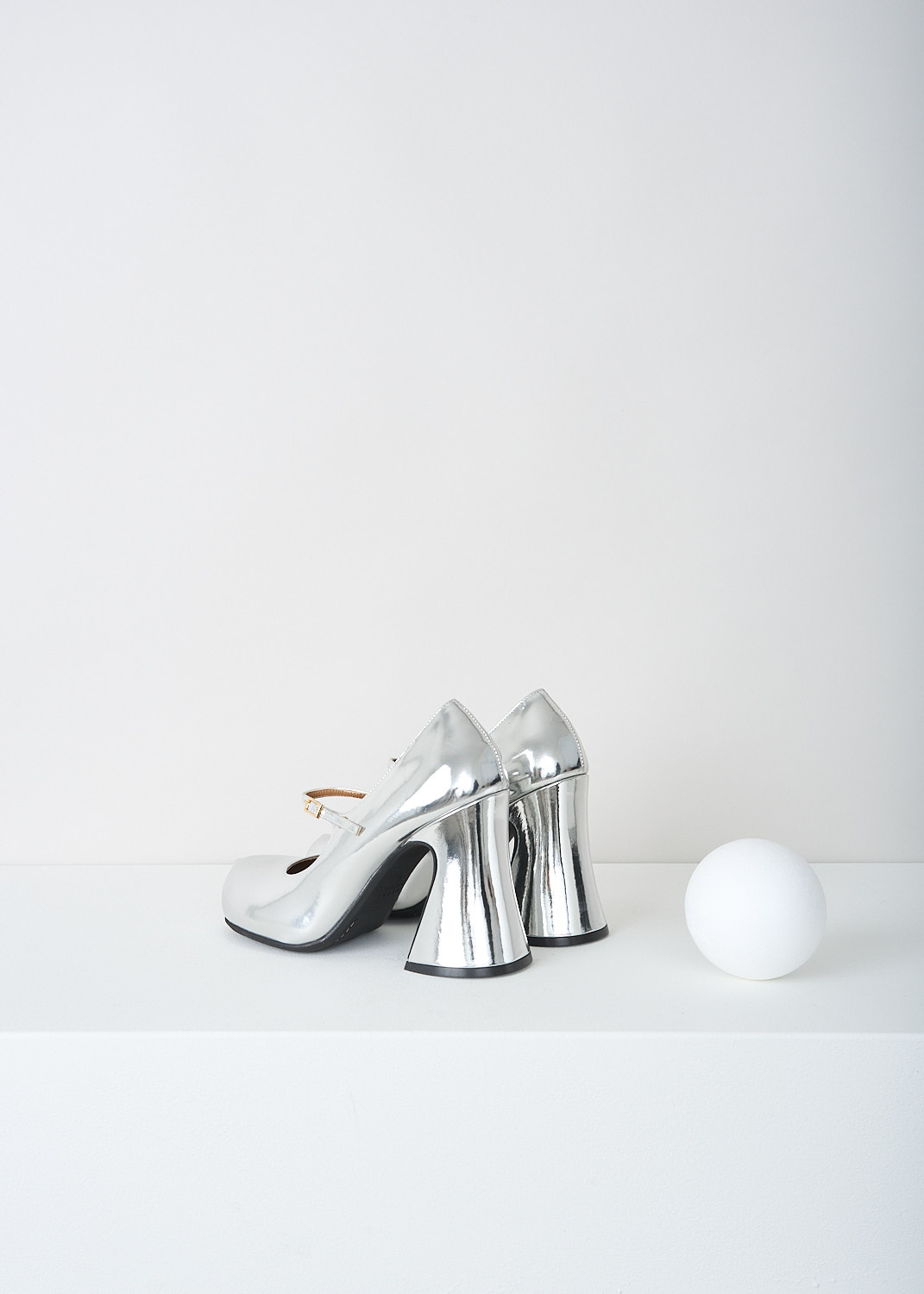 Marni, Metallic silver Mary-Jane pumps, MJMS006210_P0410_00N20, Silver, Back, These metallic silver Mary Jane pumps have an adjustable ankle strap closure with a gold-tone buckle, a chunky blocked heel and a round toe. 
