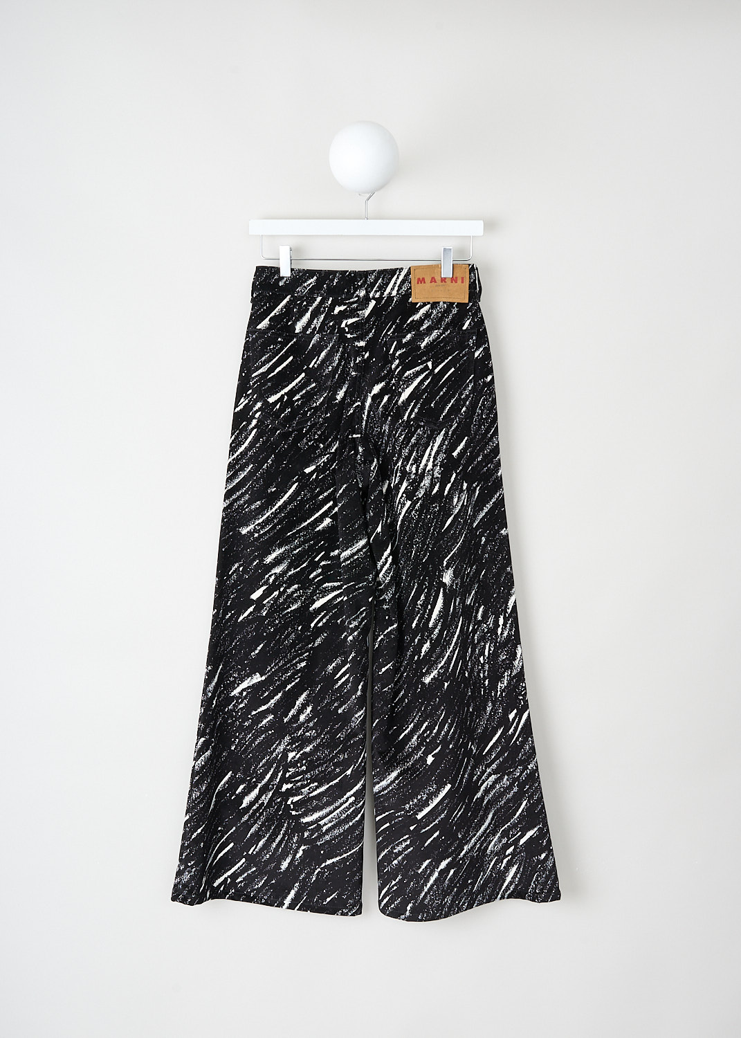 Marni, Black-and-white flared pants, PAJD0514A0_UTC432_CRN99, Black, White, Print, Back, These black-and-white print crayon flock pants have a waistband with belt loops and a button-and-zip closure. These pants have a classic five-pocket style. The flared pants are slightly cropped. These pants sit at the waist. 

