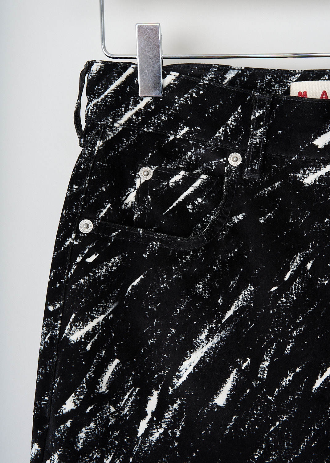 Marni, Black-and-white flared pants, PAJD0514A0_UTC432_CRN99, Black, White, Print, Detail, These black-and-white print crayon flock pants have a waistband with belt loops and a button-and-zip closure. These pants have a classic five-pocket style. The flared pants are slightly cropped. These pants sit at the waist. 
