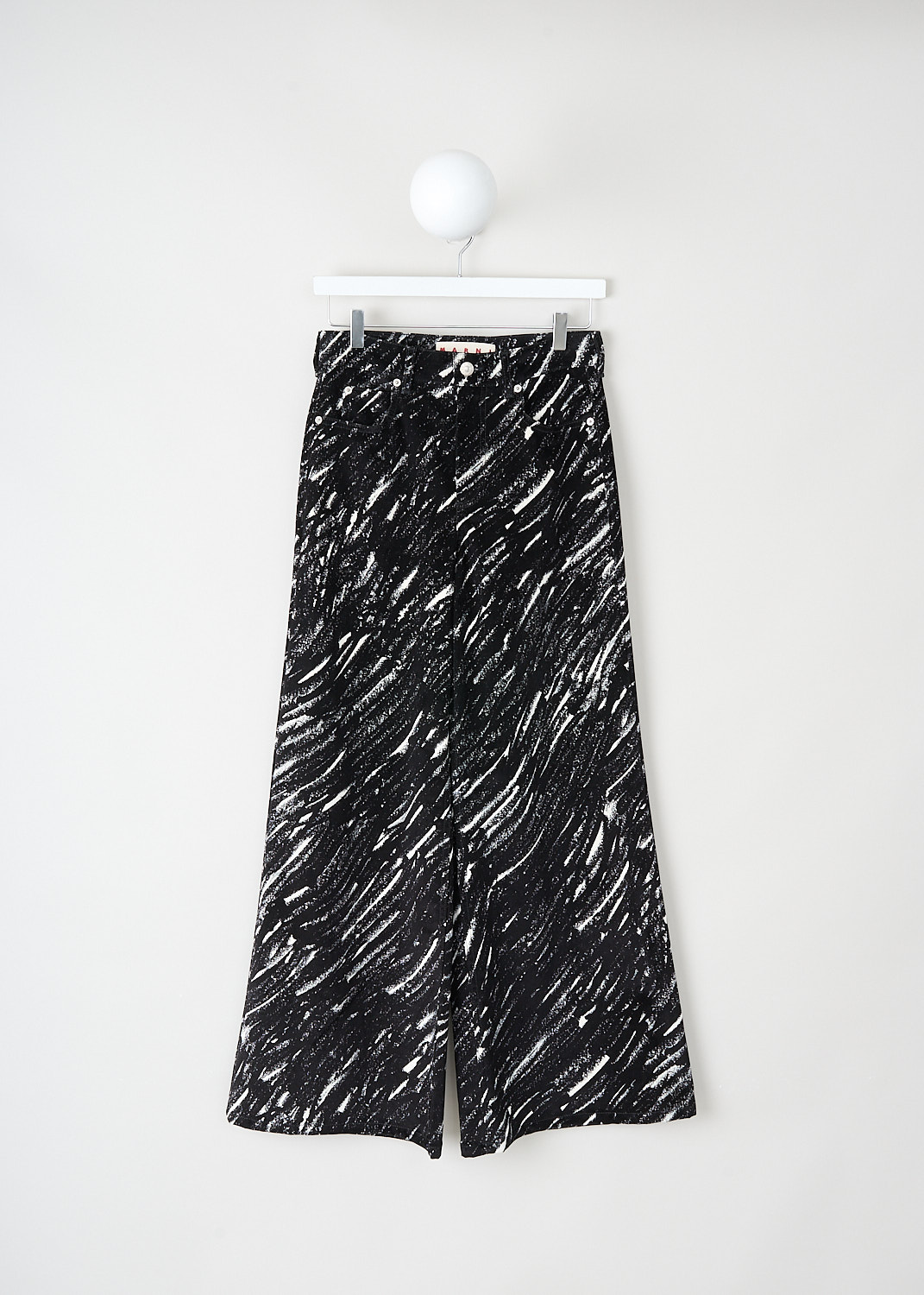 Marni, Black-and-white flared pants, PAJD0514A0_UTC432_CRN99, Black, White, Print, Front, These black-and-white print crayon flock pants have a waistband with belt loops and a button-and-zip closure. These pants have a classic five-pocket style. The flared pants are slightly cropped. These pants sit at the waist. 
