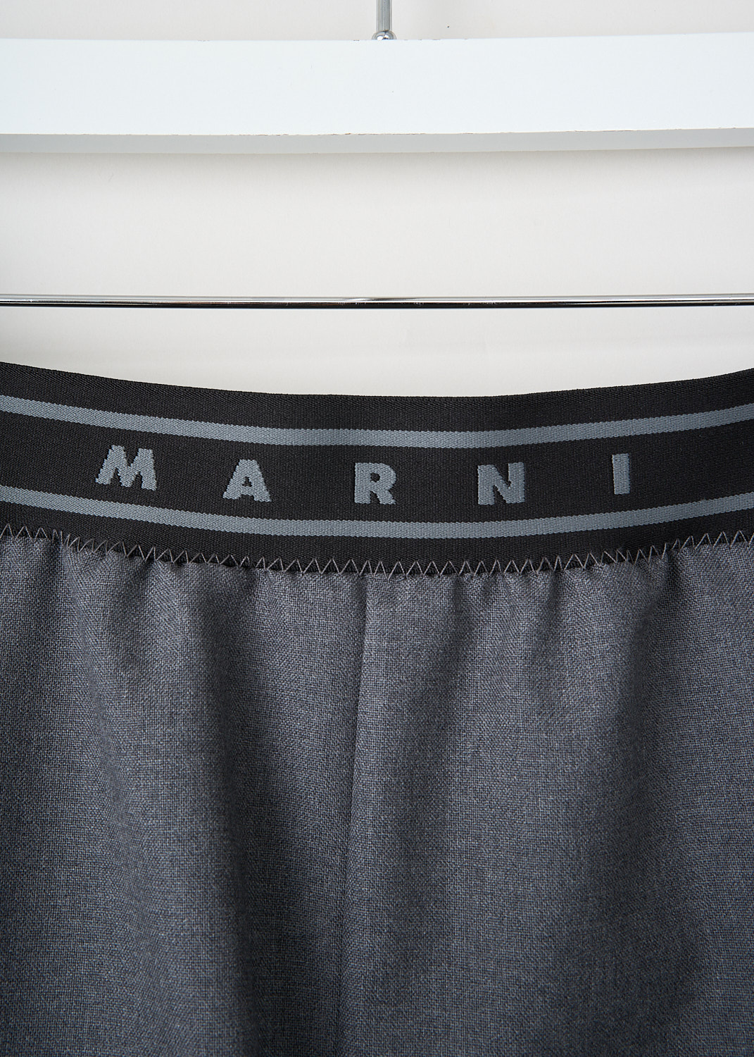 Ash grey Marni wide-leg shorts with elasticated logo waistband and side inset pockets, front view, Kiki’s Stocksale Maastricht designer boutique