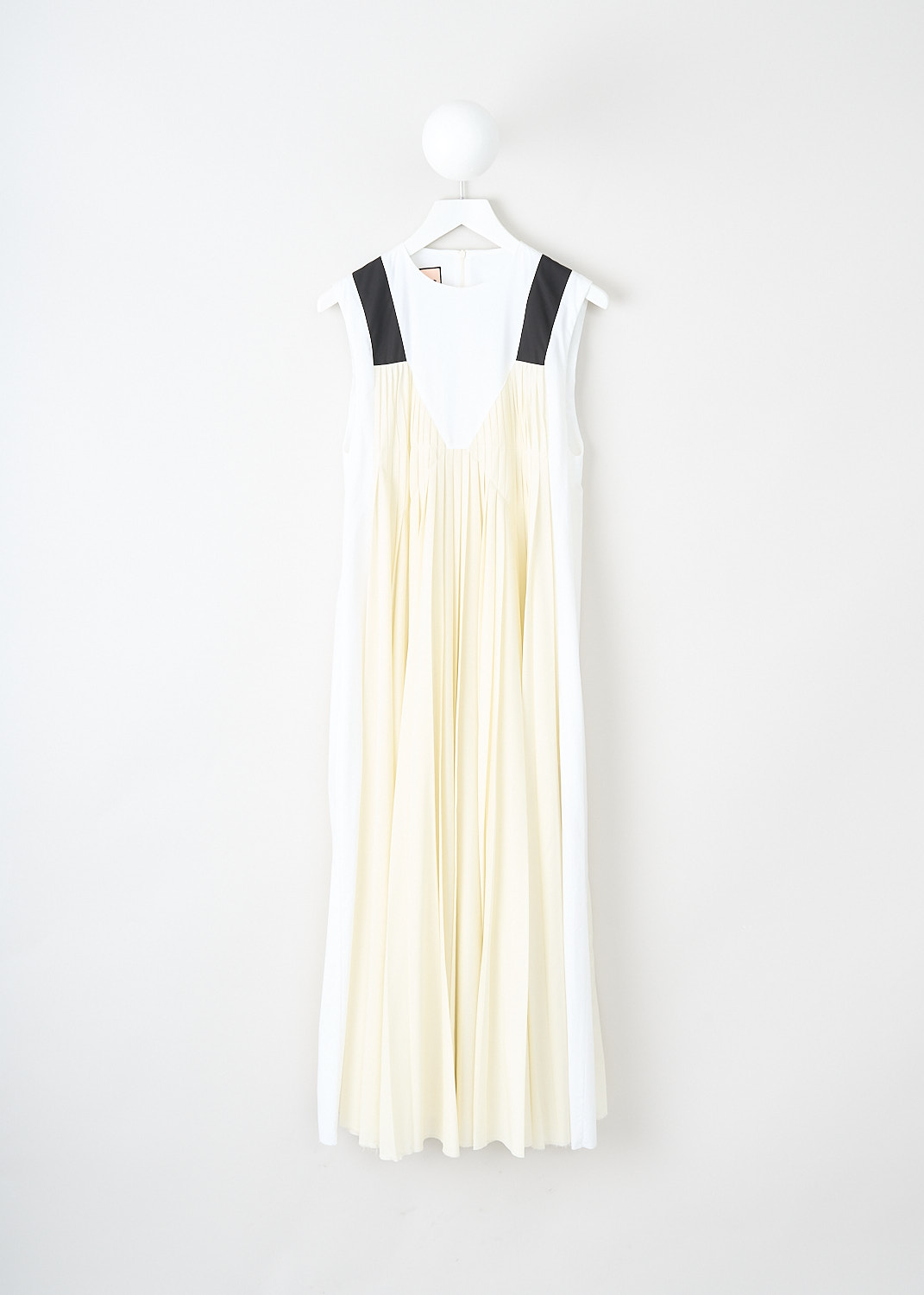 Plan C, Butter yellow pleated maxi dress, ABCAF05NE_HTP105_00W02, White, Yellow, Front, This sleeveless pleated maxi dress has a high round neckline. The dress has a white cotton base with, both on the front and back, a pleated butter yellow fabric that creates the illusion of a slip dress with broad black straps. The dress has concealed slanted pockets. In the back, a concealed centre zip functions as the closure. 
