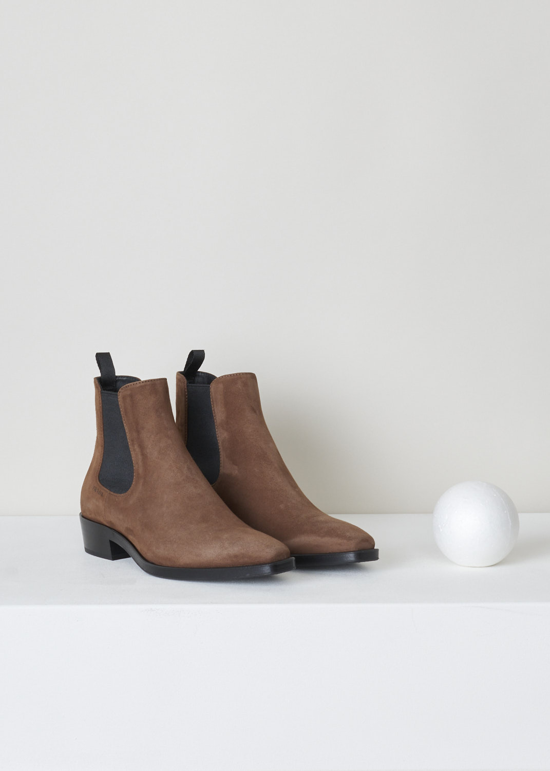 Prada, Brown suede chelsea boots, Camoscio_1T929I_F0038_bruciato, brown black, front, Brown suede chelsea boots featuring a contrasting black elastic side panel, and a pull tab on the back of the boot. Furthermore the sole is similarly contrasted which gives the boots more depth.