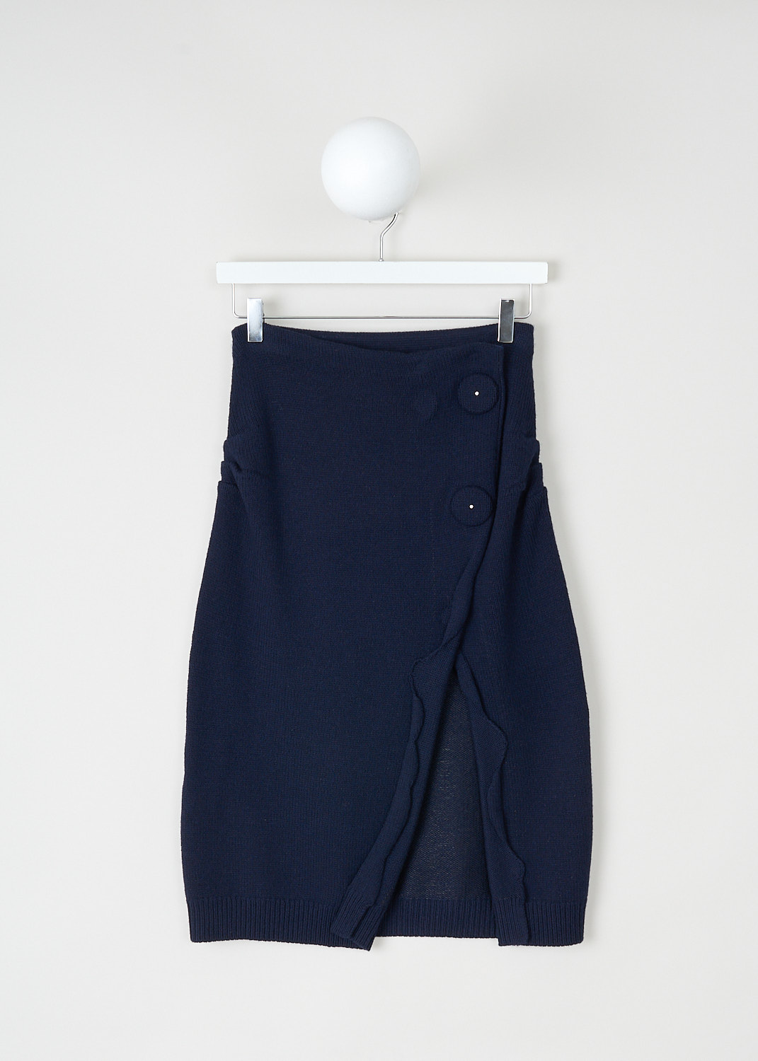 Prada, Midi wrap skirt with frumpled-look, 129O_CASHMERE_WOOL_F5_21435_F0008_BLEU, Blue, Front, This blue knit wrap skirt has an intentionally frumpled look. On the front, the skirt has two big circular press buttons. The skirt has a centre slit in the front. 
