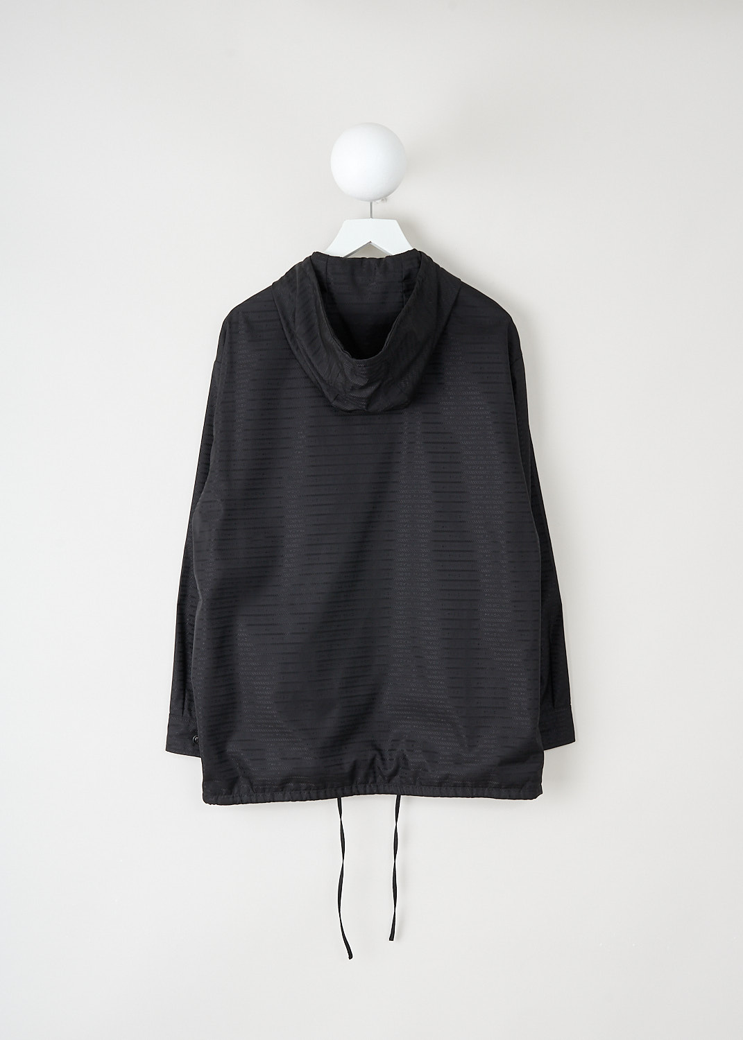 Black Re-Nylon jacket by Prada back view with hood and clean design available at Kiki's Stocksale in Maastricht