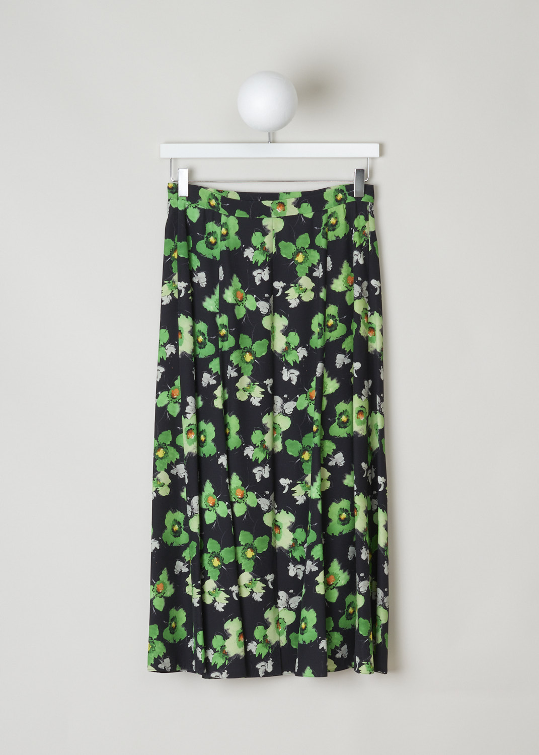Prada, Black semi-circular skirt with green floral motif, sable_raso_narc_P152S_F077U_smeraldo, print, back, Starting from the top this mid-length skirt comes with a narrow waistband, with the fastening option being on the left side. The seams coming of the waistband are ruched and adds more excitement to this model. Furthermore, this model does flare out, and has a short split on the back.