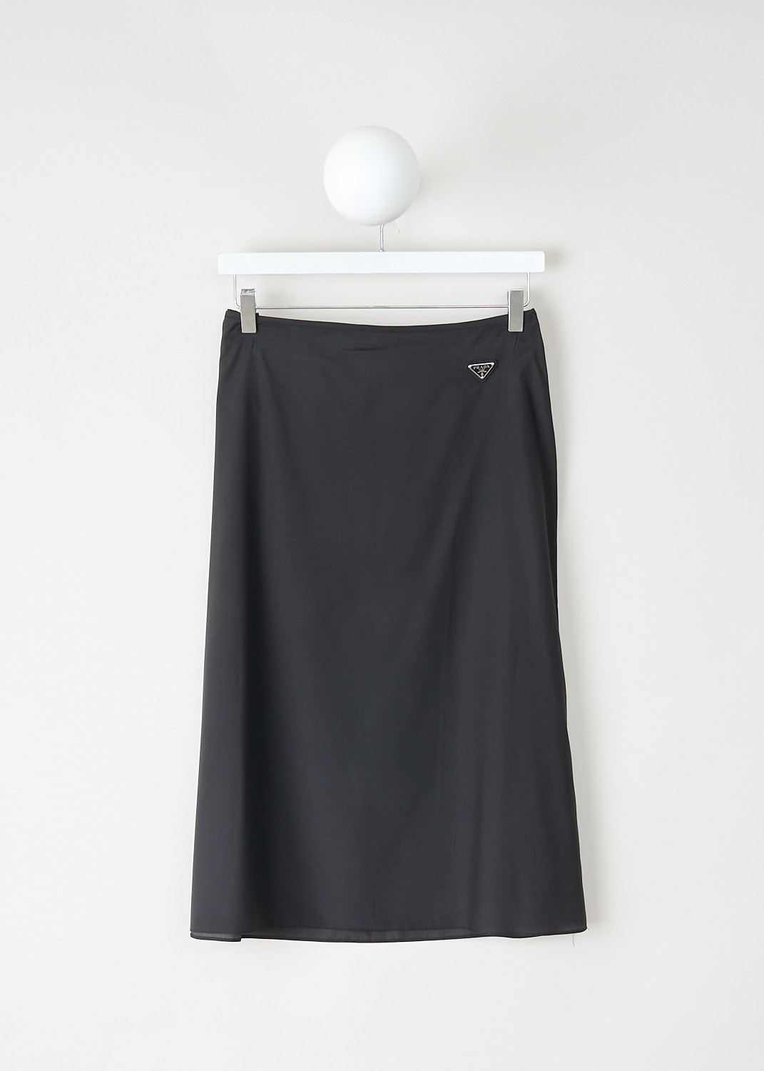 Prada black silk slip skirt with minimalist silhouette and enamelled triangle logo at Kiki's Stocksale Maastricht designer outlet.