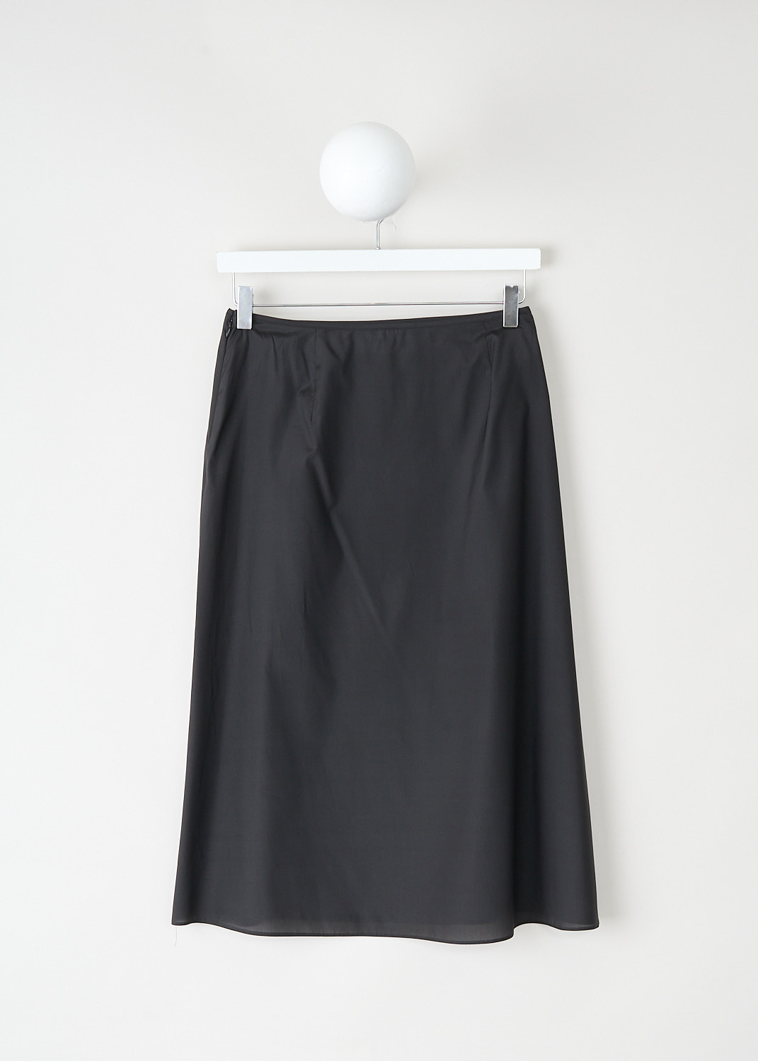 Back view of black silk slip skirt with concealed side zip closure by Prada at Kiki's Stocksale luxury designer outlet Maastricht.