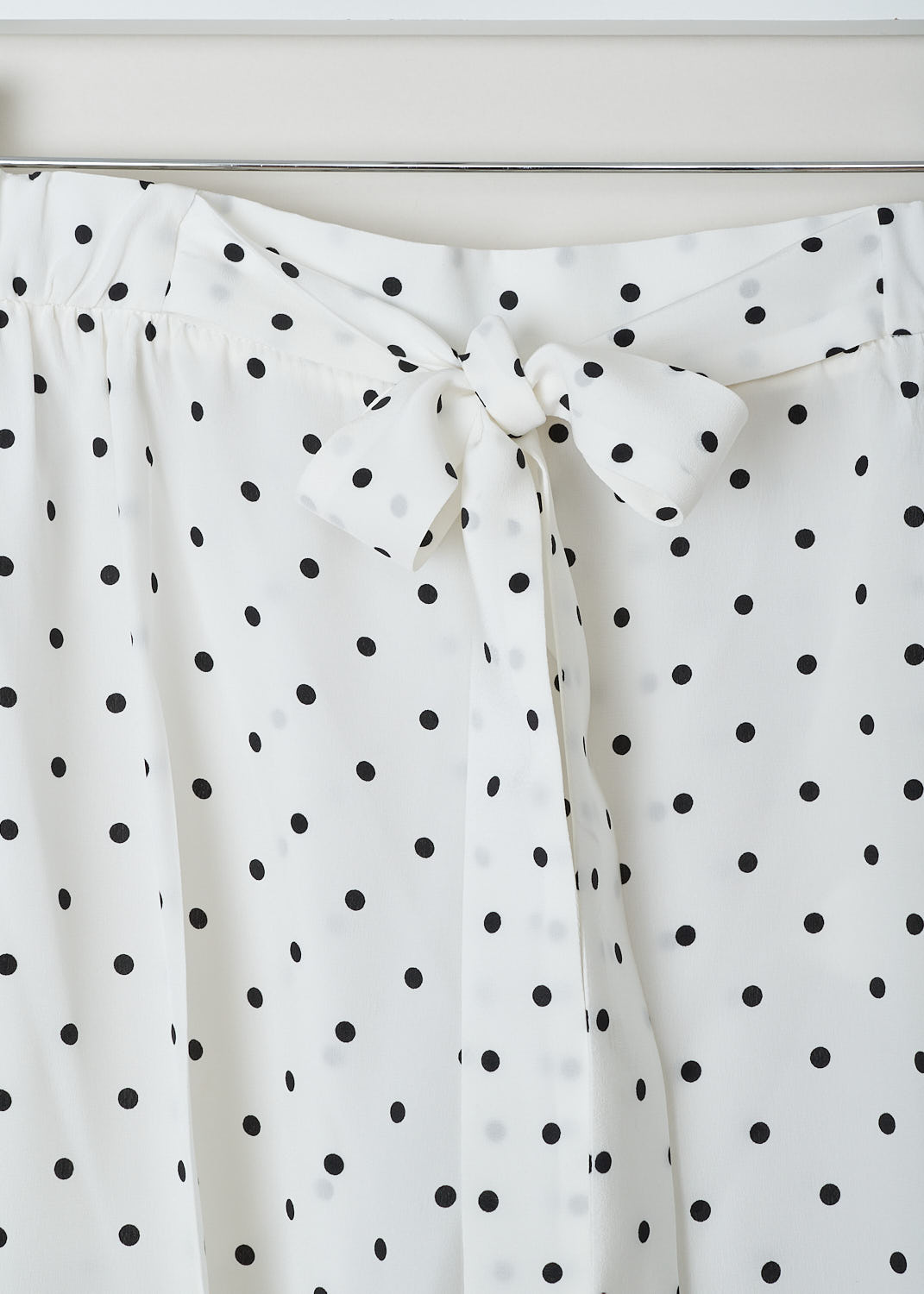 Prada, White silk polka-dot pants, CDC_POIS_P225EL_AVORIO_NERO, White, Print, Detail, These semi see-though polka-dot print pants have a belted waist. A concealed side zip closure can be found along the seam. These pants have slanted pockets.
