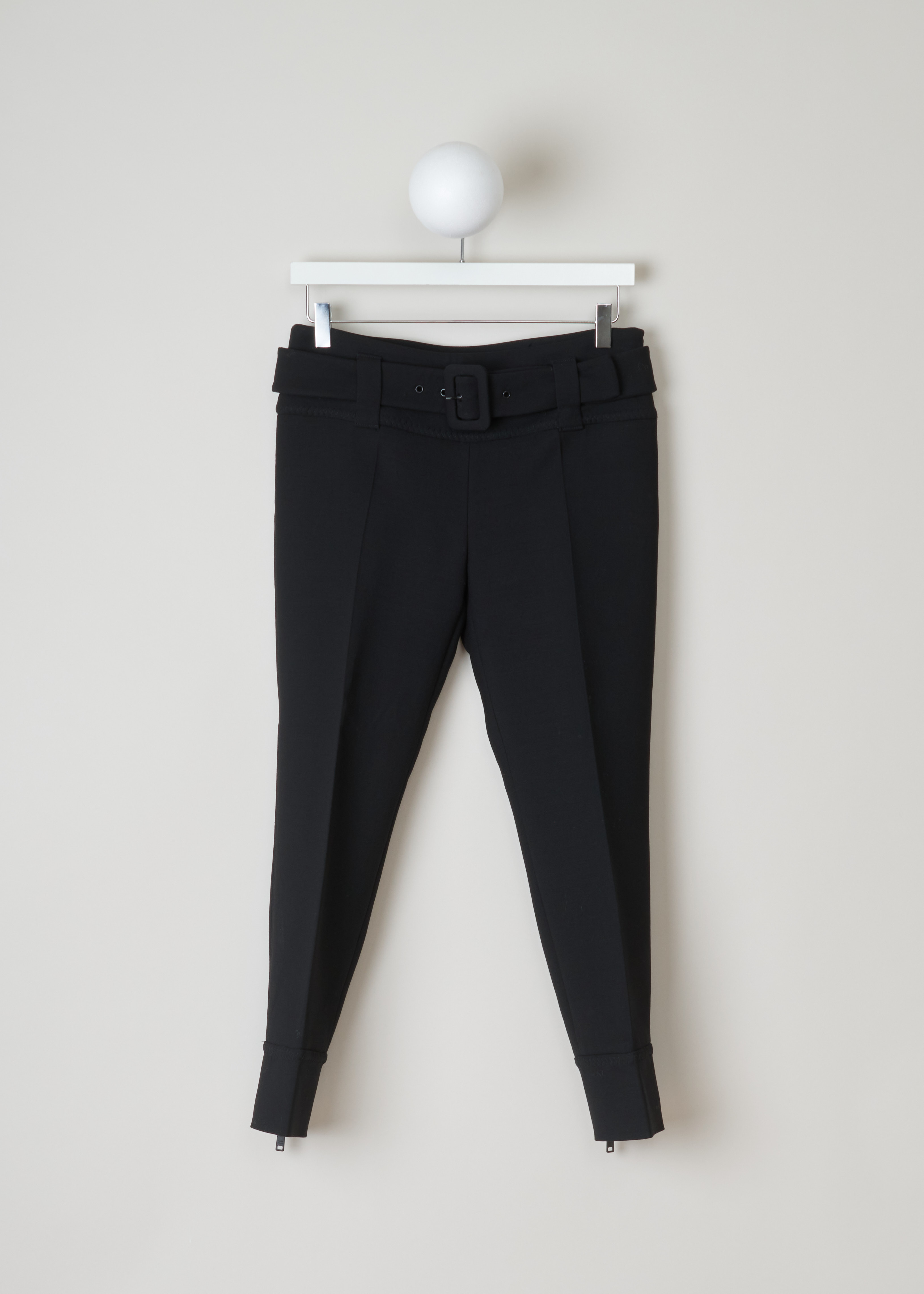 Prada Black belted trousers Natte_Double_Im_P271BH_F0002_Nero front. Fitted black trousers with a wide waistband with belt loops and a detachable belt in the same fabric, an invisible zipper fastening on the side, centre creases and cuffed hems.