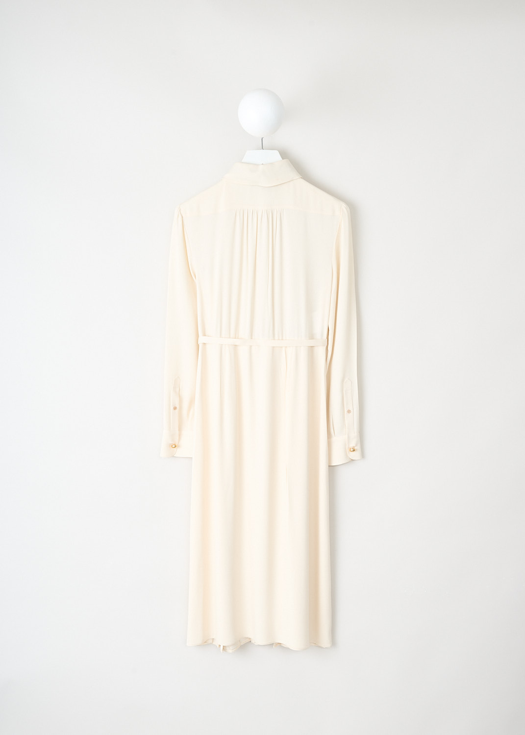 Back view of the off-white satin maxi dress showing pleated skirt and smooth silhouette by Prada, available at designer boutique Kiki's Stocksale in Maastricht.