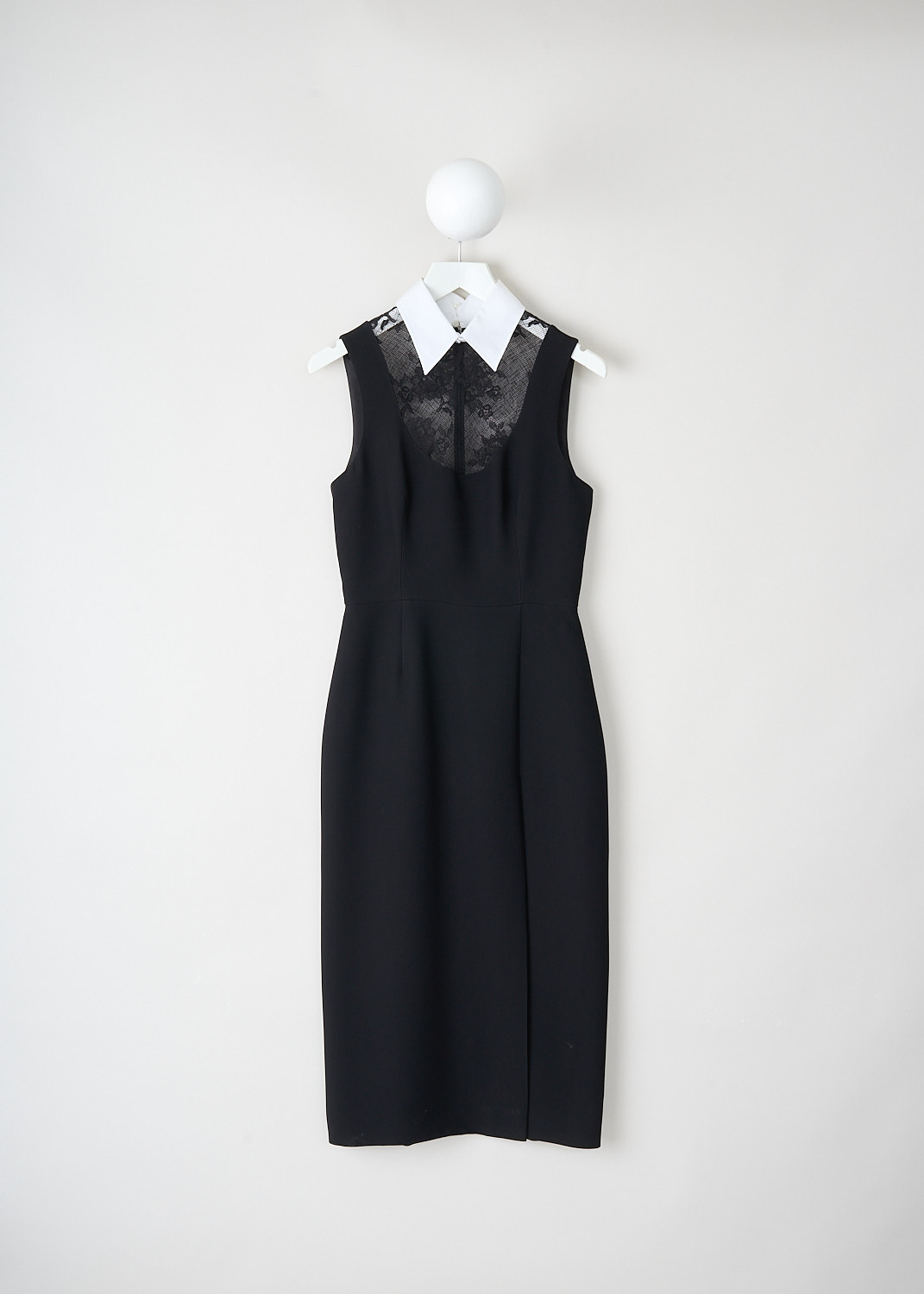 Black sleeveless maxi dress by Prada with white classic collar, lace inserts on chest and back, front slit and structured seam detail, available at Kiki’s Stocksale Maastricht designer outlet.