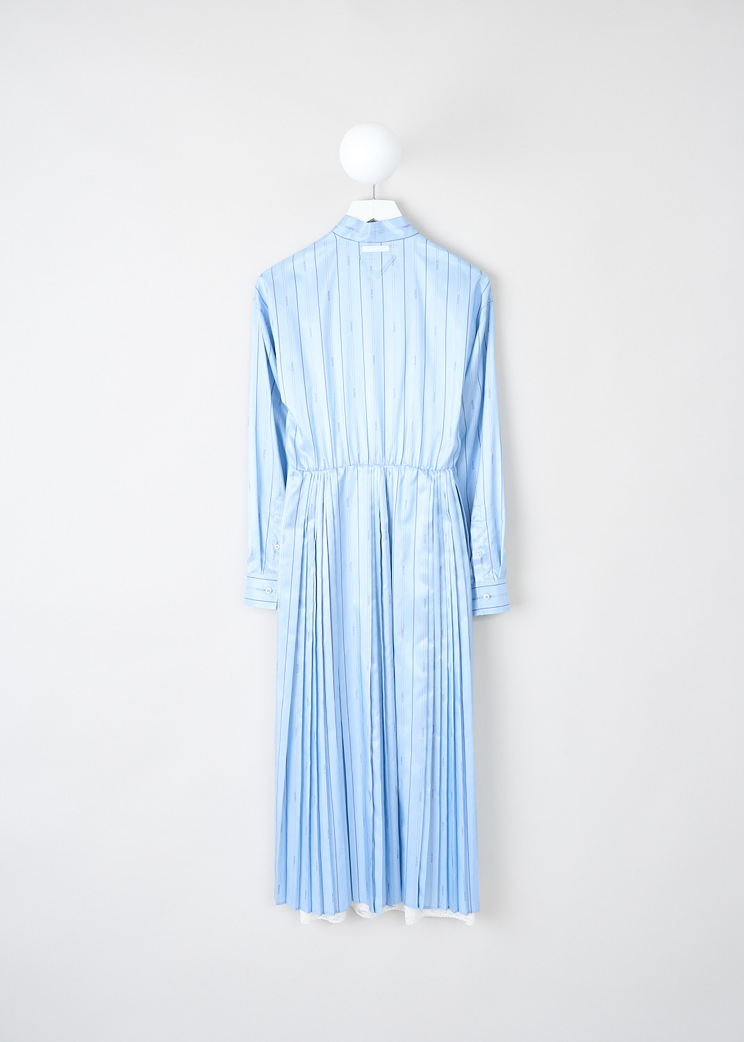 Prada, Light blue striped pleated dress, 11C5_PONGE_PRADA_P3H47_F0076_CELESTE, Blue, Back, This light blue striped pleated dress has a round neckline with a bow tie-detail. The long sleeves have buttoned cuffs. The bodice has a single breast pocket and a partial front button placket that stops at the waist. A concealed side zip functions as the closure. The midi skirt is pleated throughout. On the back of the neck, the brand's triangle logo can be found in the same fabric. The dress comes with a white slip dress. 
