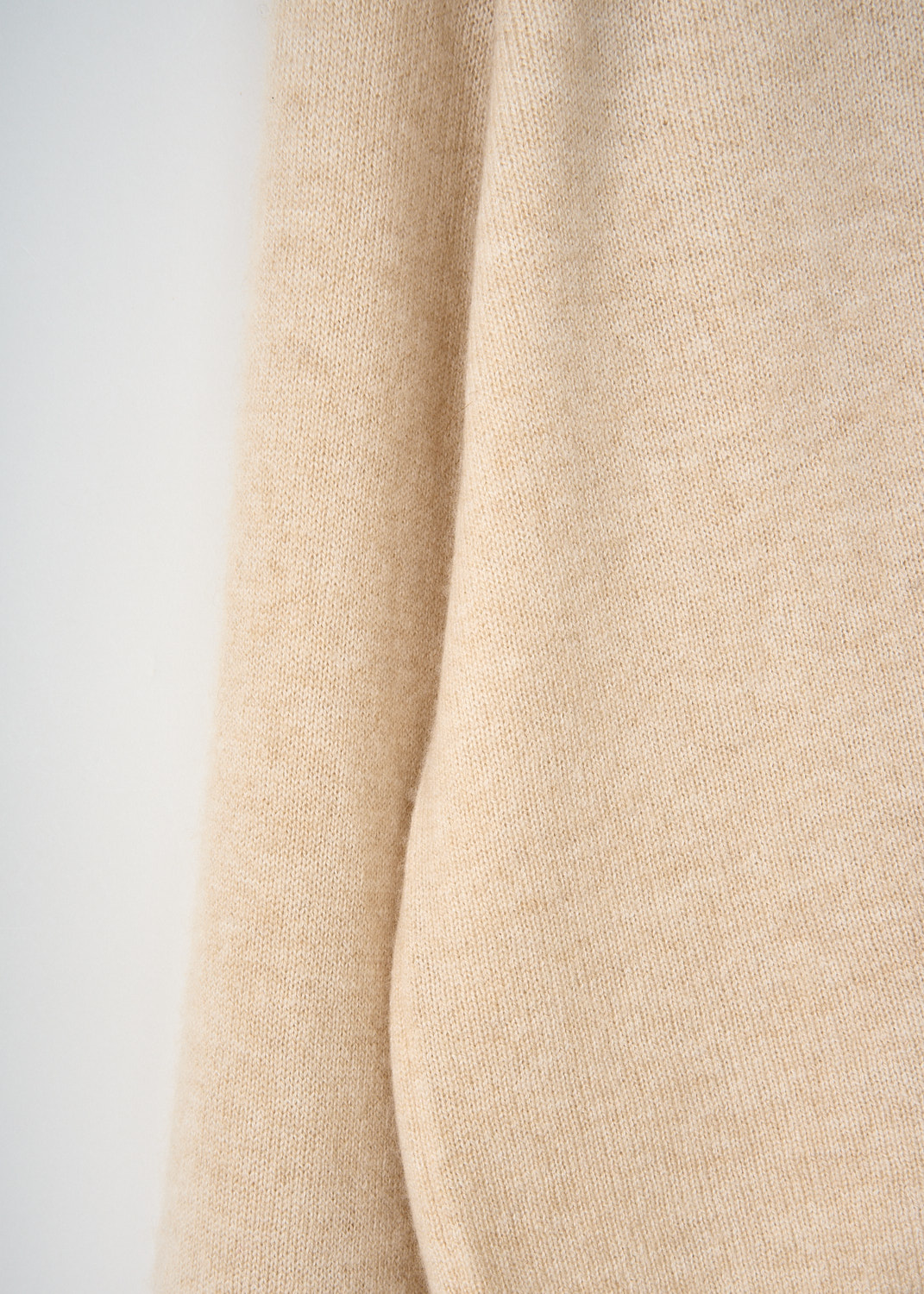 Close-up of the Sahara Sofie d’Hoore cardigan highlighting the soft 70% wool and 30% cashmere blend and refined button detailing – high-end designer item at Kiki’s Stocksale.
