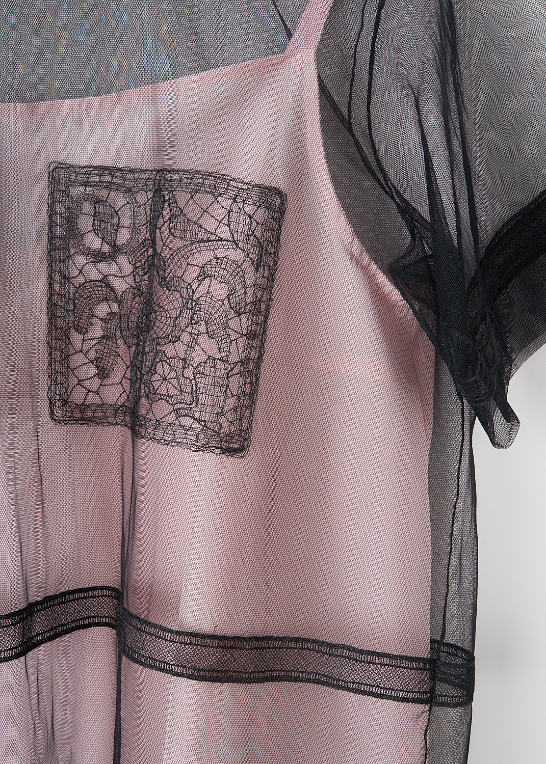 Sofie d'Hoore, Black mesh Birdie top, BIRDIE_NYCE_02_BLACK, Black, Pink, Detail, This black tulle Birdie top has a round neckline and short sleeves. The top has embroidered detailing on the bust and embroidered trims on the sleeves and along the waits. The sheer white tulle creates a layered look with the detachable pink camisole top. 
